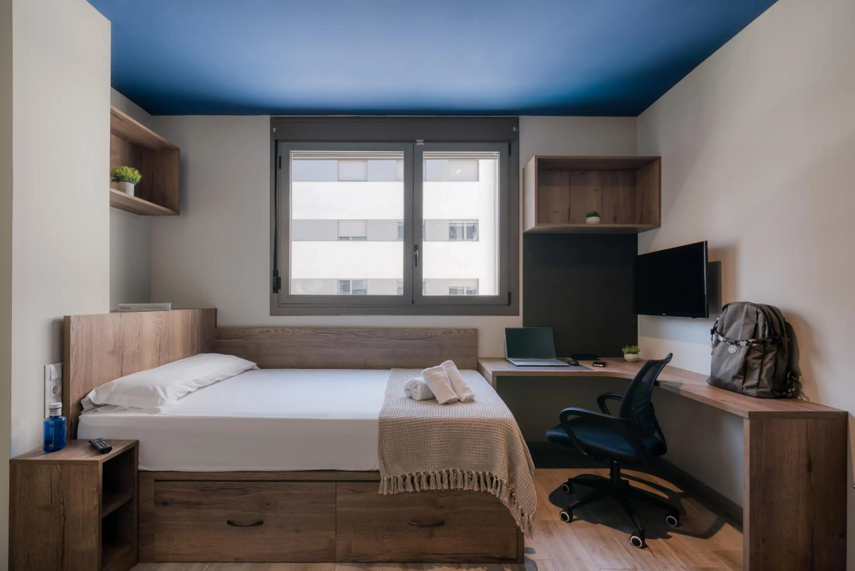 Bed in Livensa Living Studios Valencia Marina Real Hotel-Apartamento