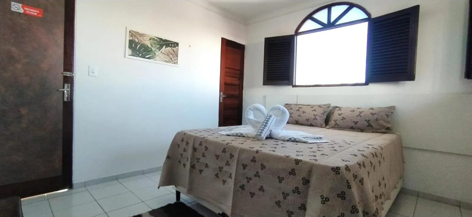 Bed in POUSADA VENTO NORTE CAMA & CAFÉ SUÍTES INDIVIDUAIs