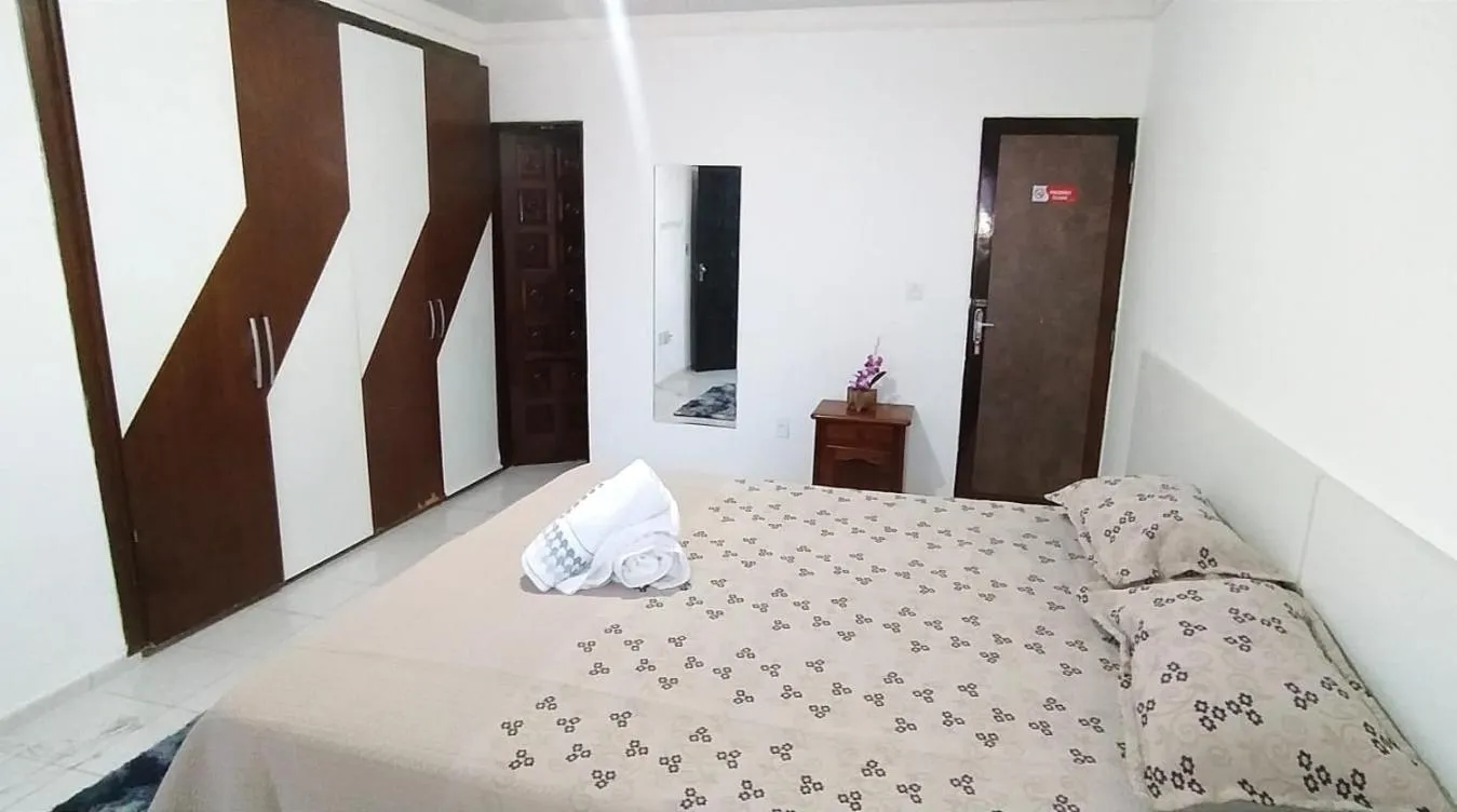 Bed in POUSADA VENTO NORTE CAMA & CAFÉ SUÍTES INDIVIDUAIs