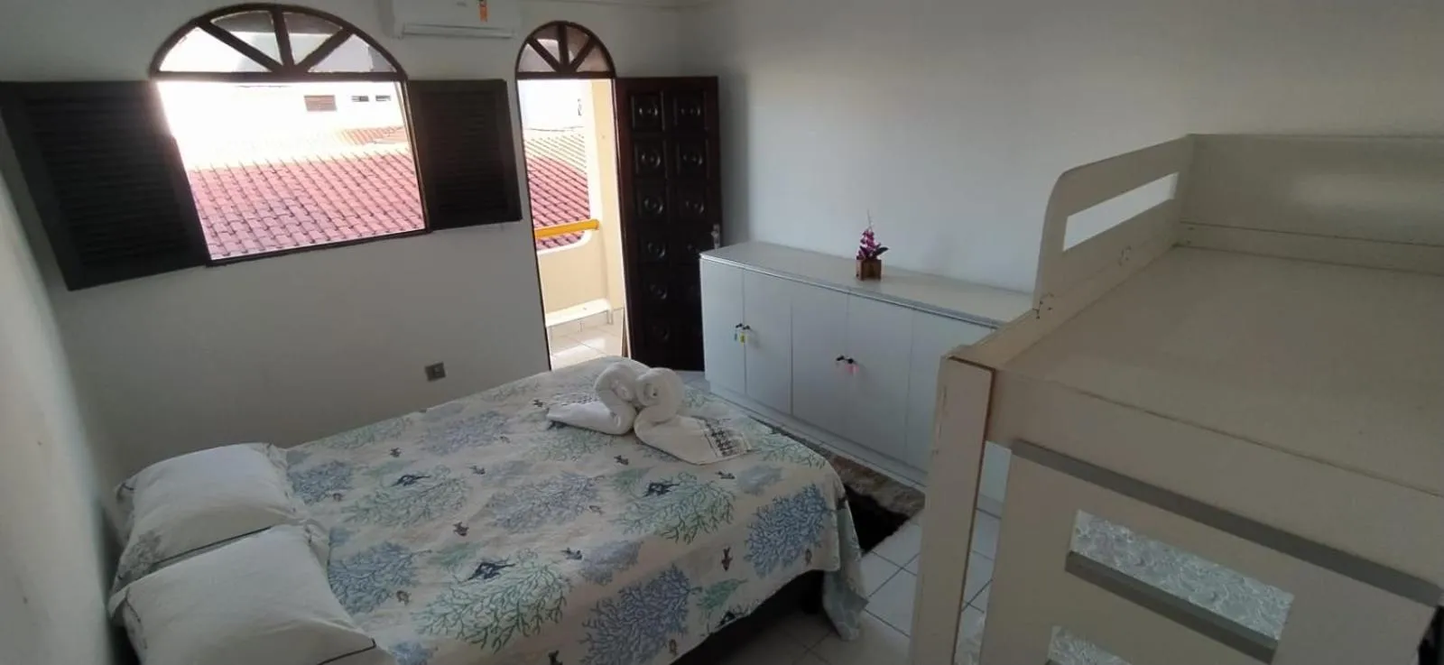 Bed in POUSADA VENTO NORTE CAMA & CAFÉ SUÍTES INDIVIDUAIs