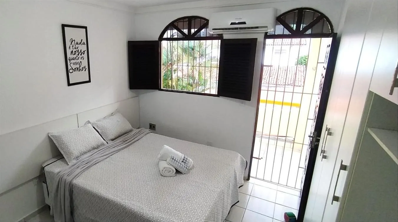 Bed in POUSADA VENTO NORTE CAMA & CAFÉ SUÍTES INDIVIDUAIs