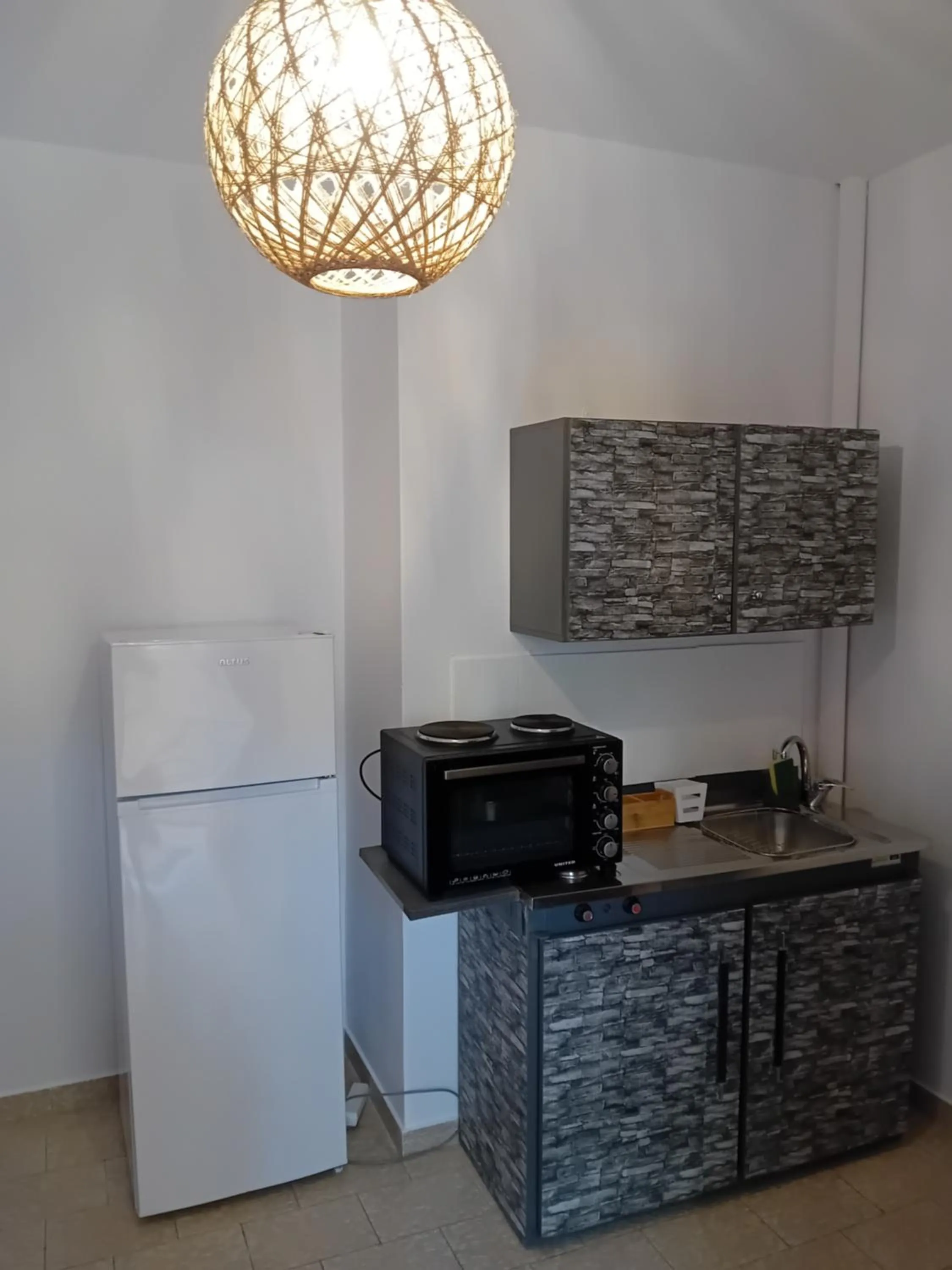 Kitchen or kitchenette in Φiloxenia Apartments