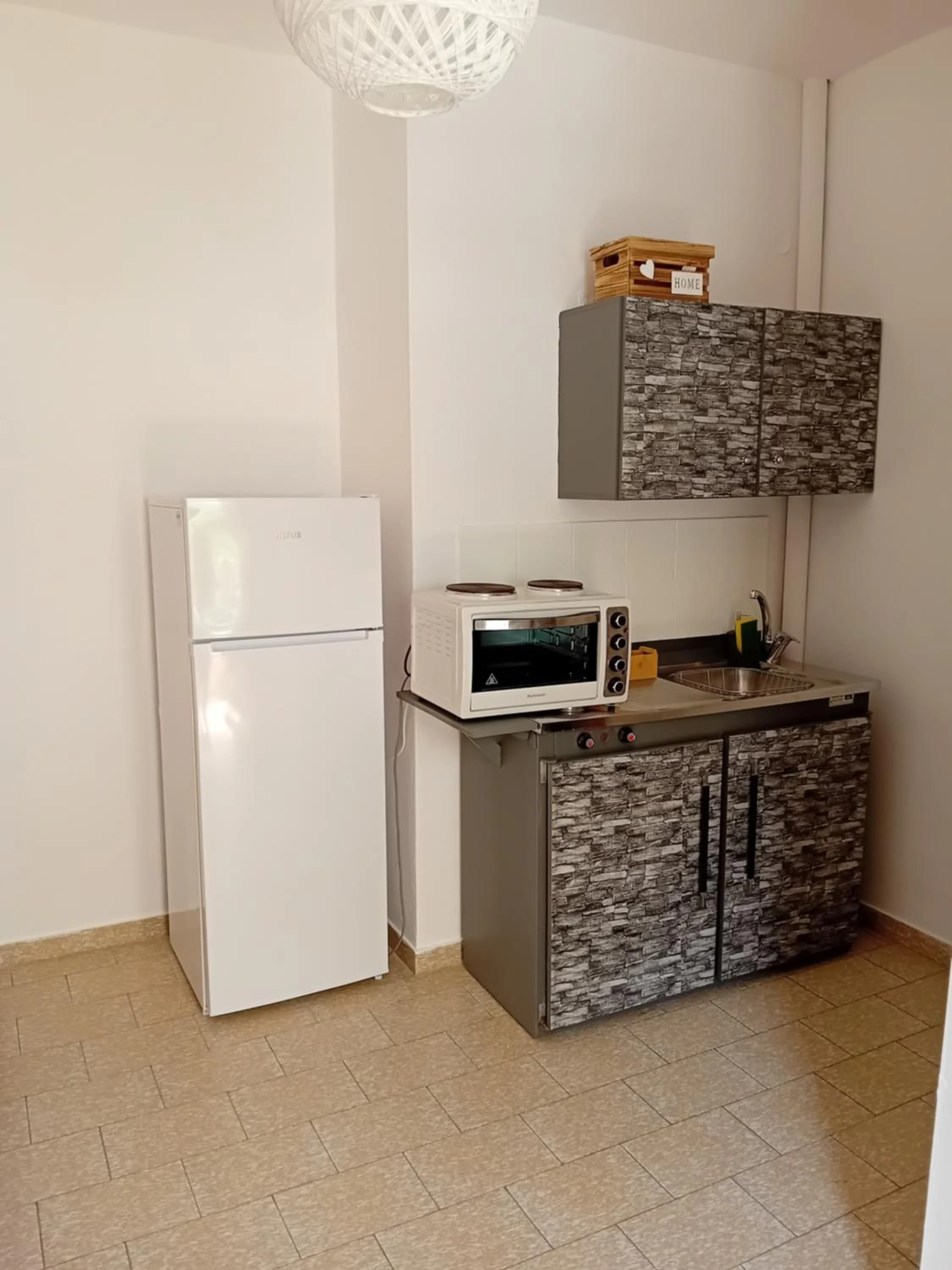 Kitchen or kitchenette in Φiloxenia Apartments