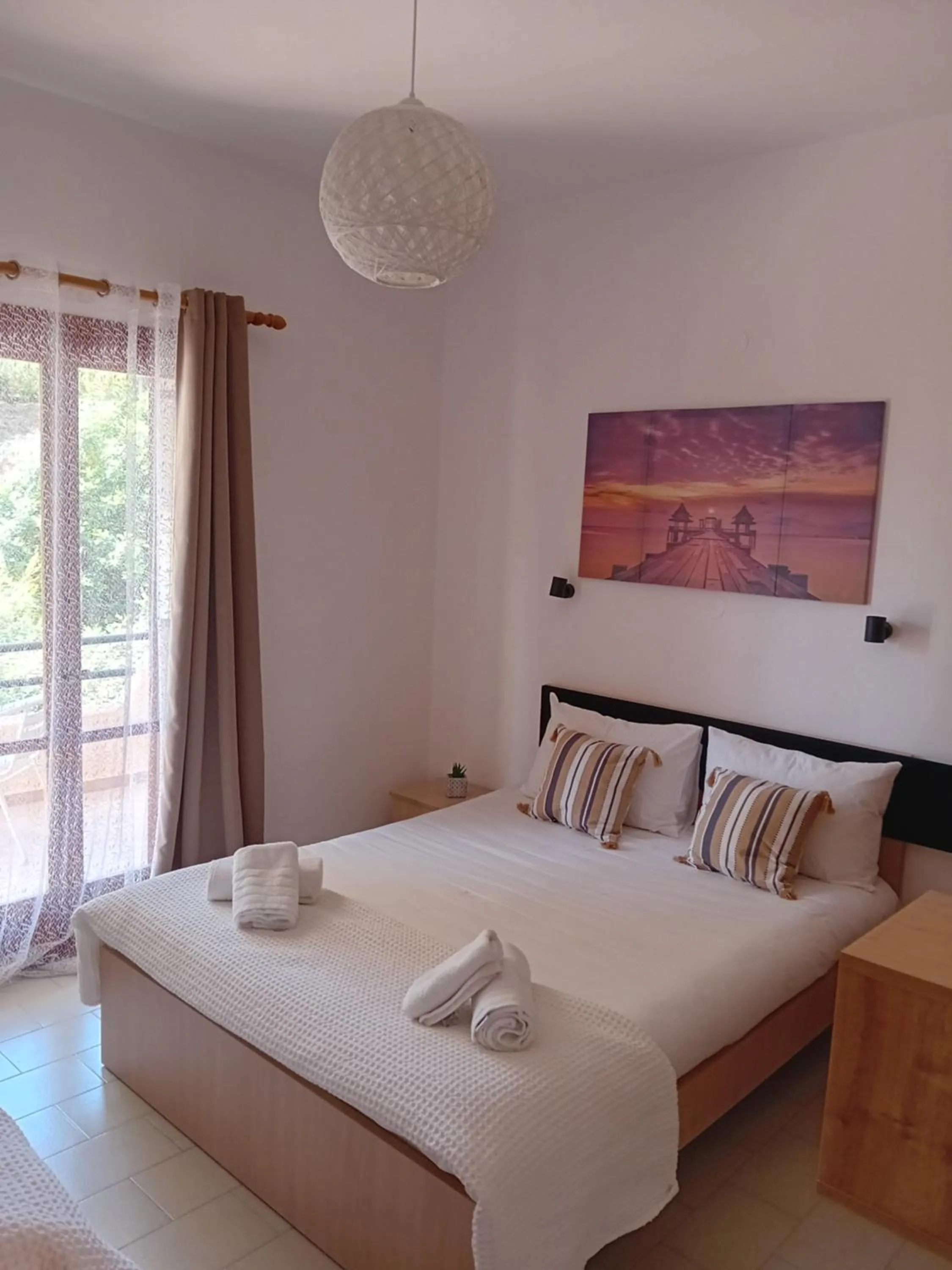 Bed in Φiloxenia Apartments
