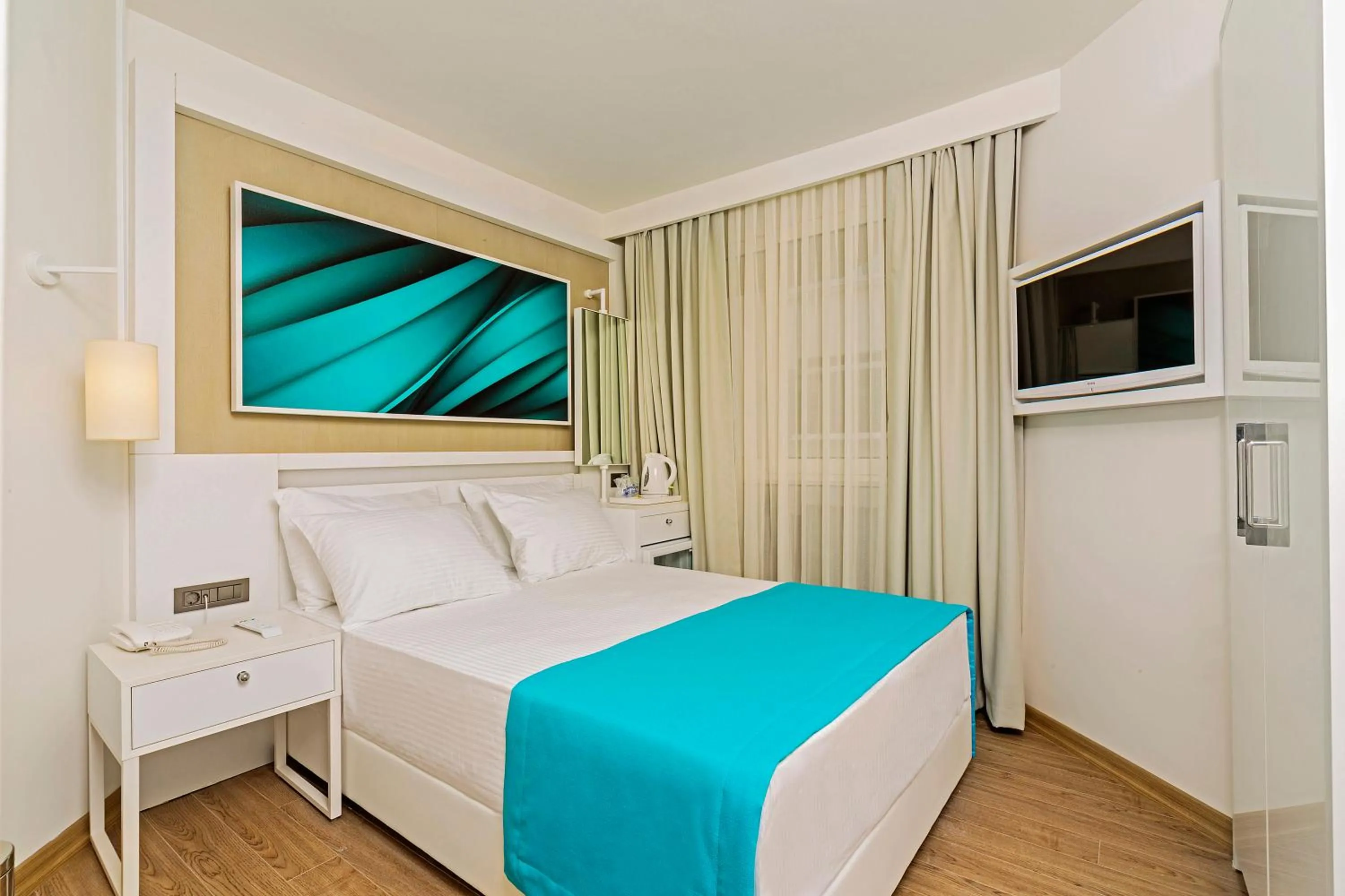 Photo of the whole room, Bed in Poseidon Hotel - Adult Only