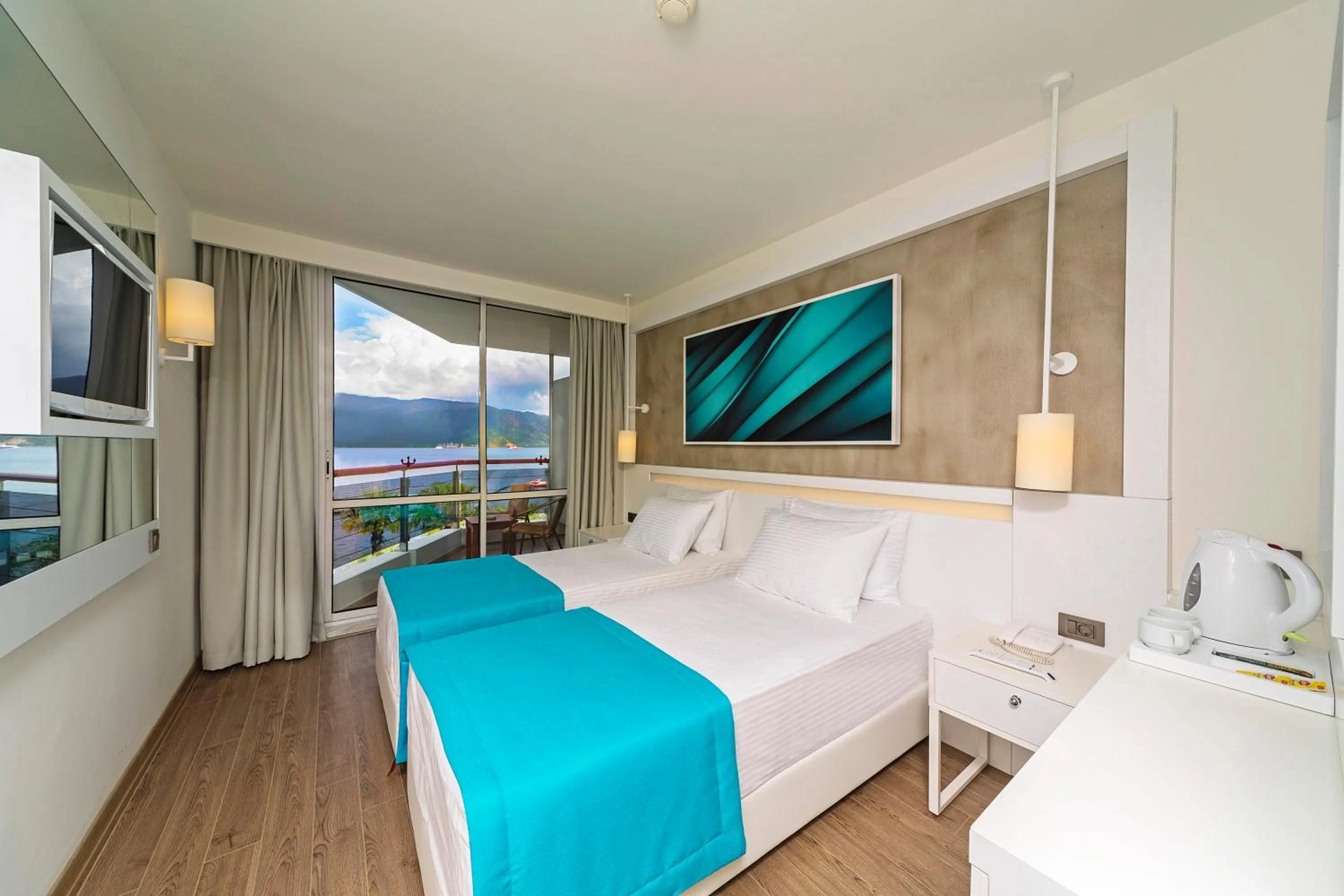 Photo of the whole room, Bed in Poseidon Hotel - Adult Only