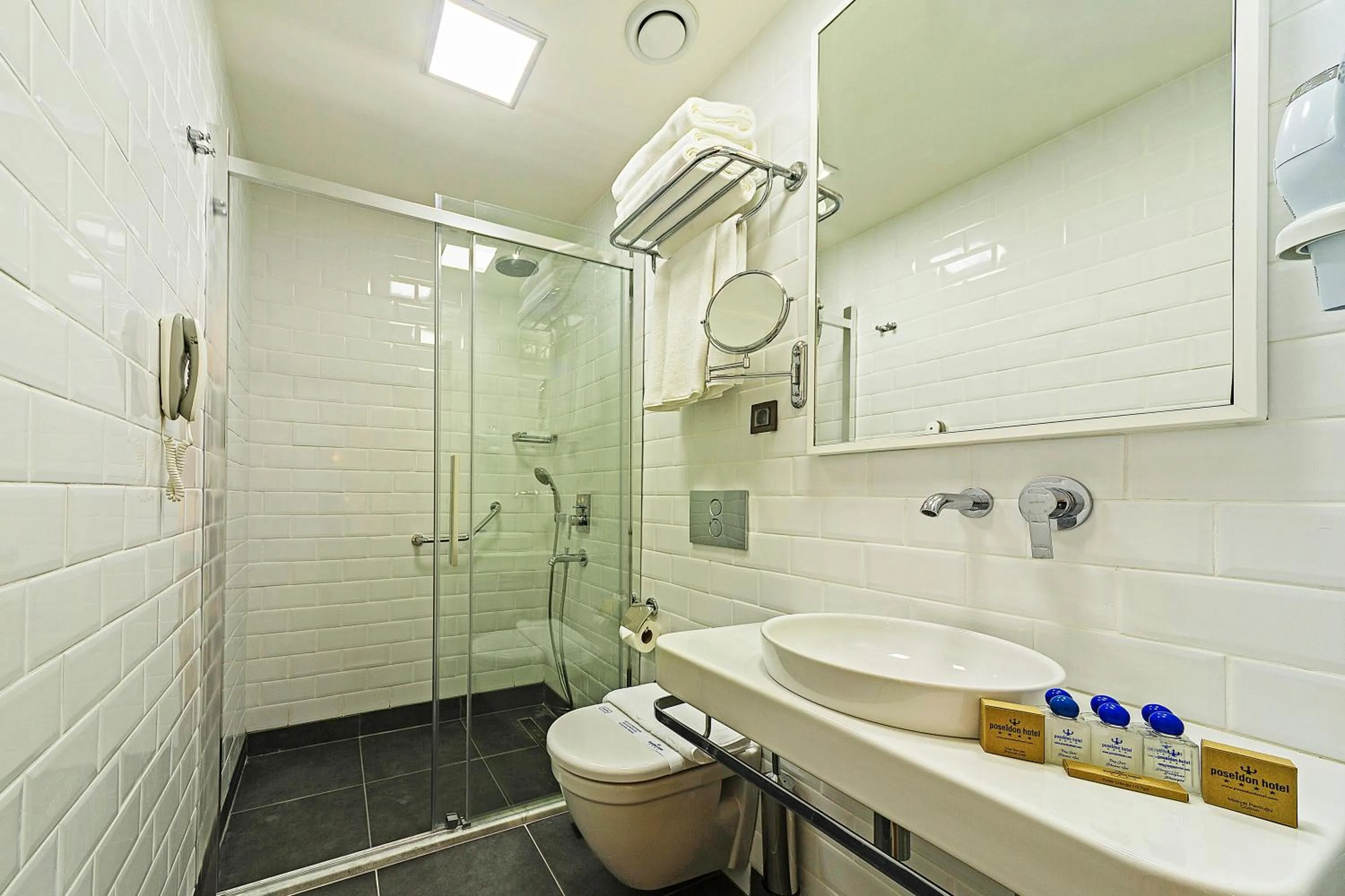 Bathroom in Poseidon Hotel - Adult Only
