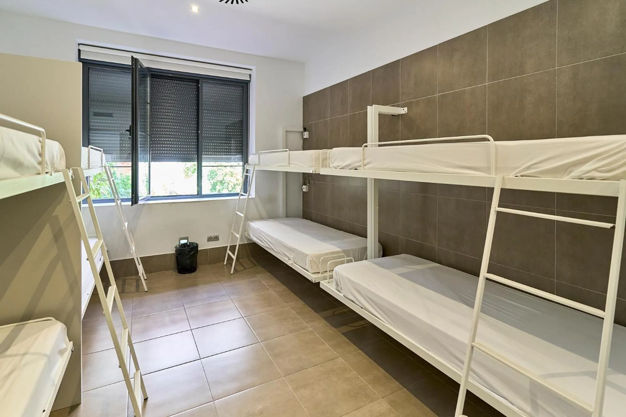 Single Bed in Dormitory Room in The Book Factory Hostel by gaiarooms