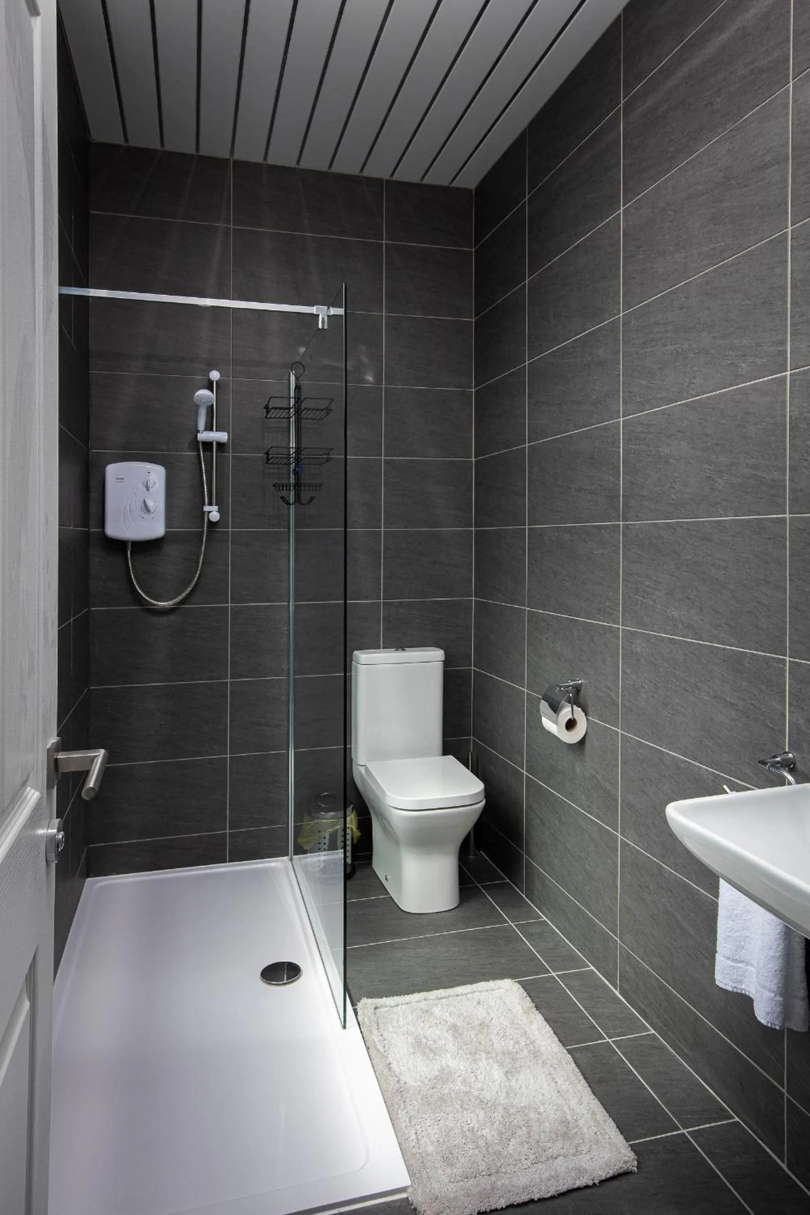 Bathroom in Town View Apartment by Sasco