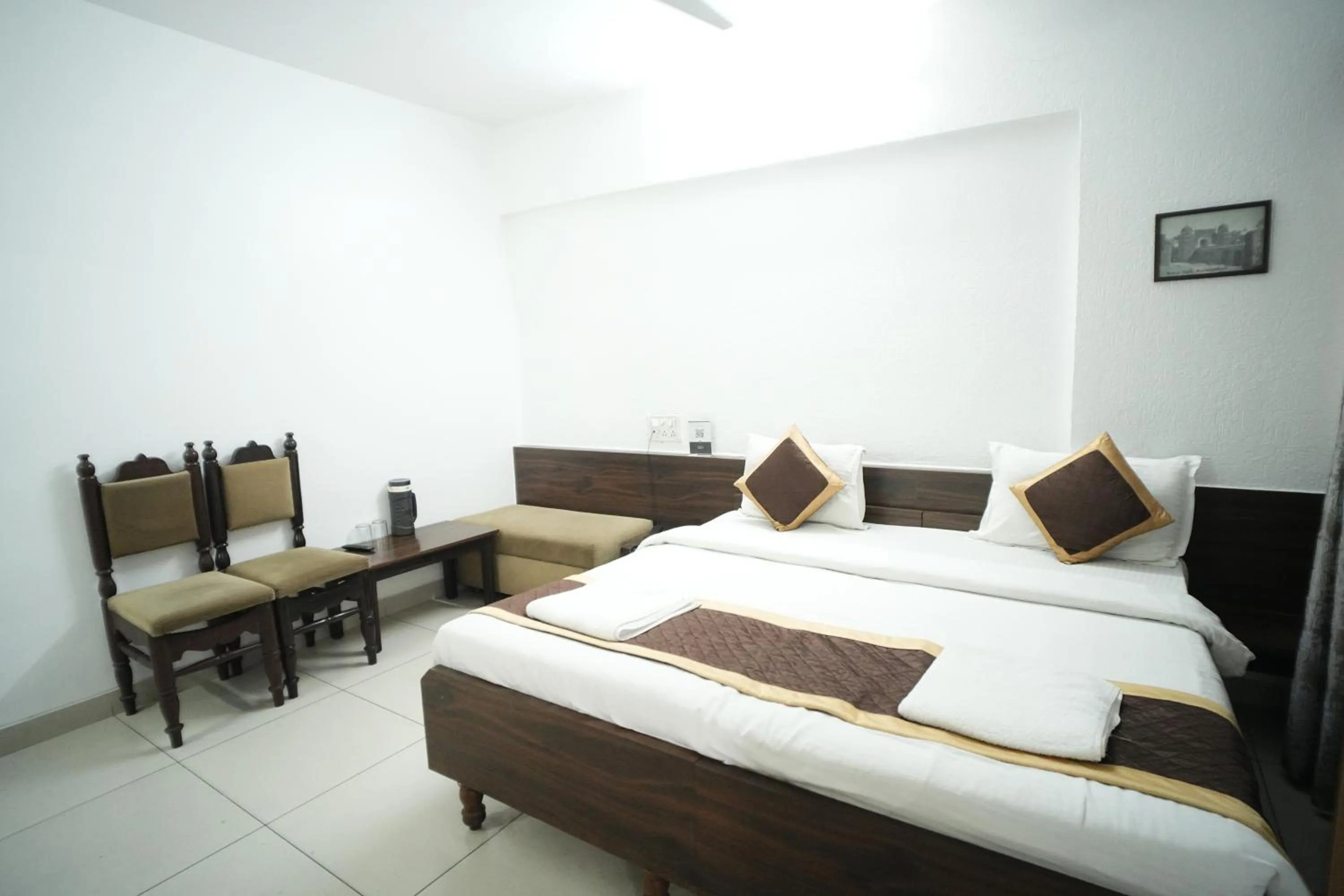 Bed in Hotel Kartiki