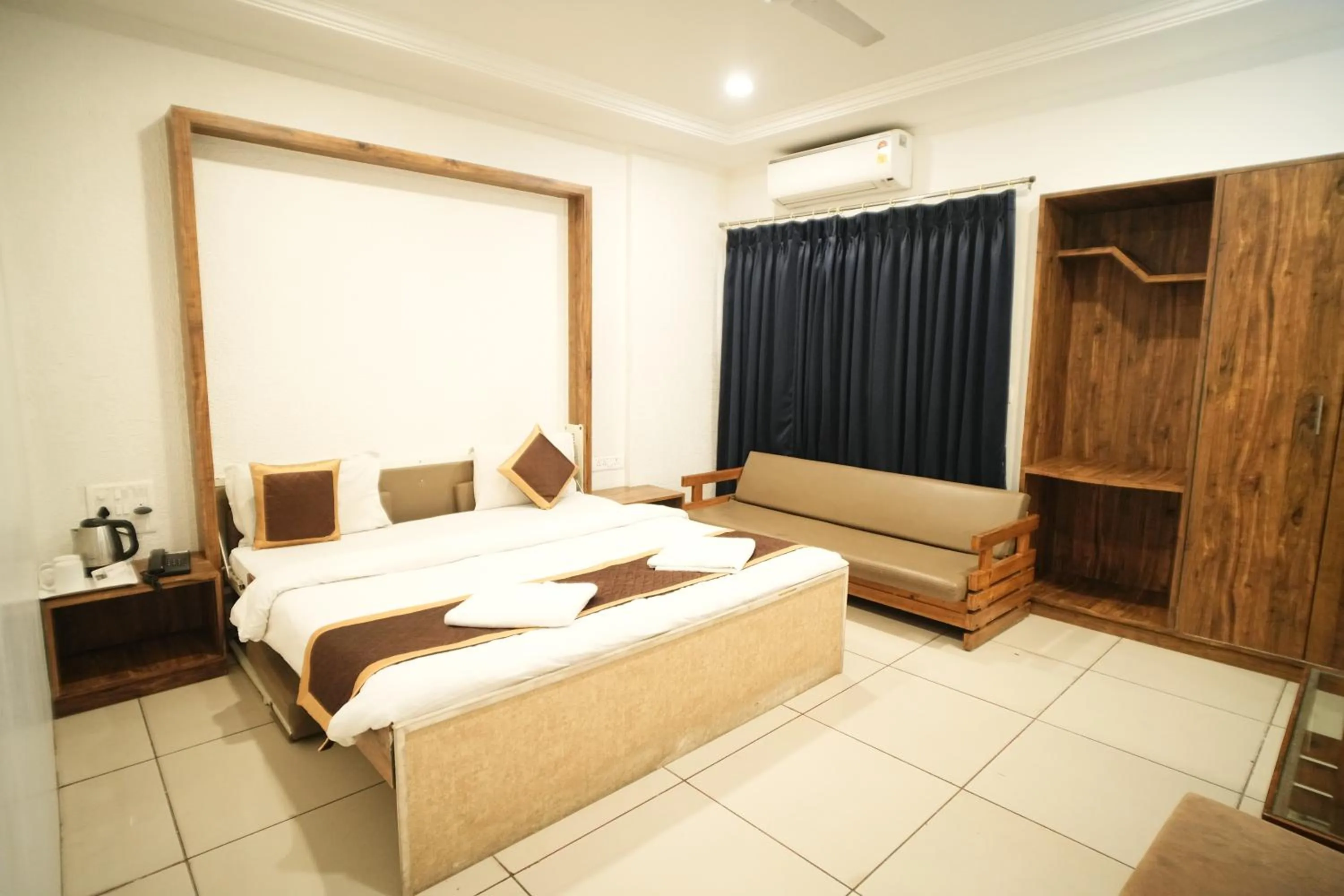 Bed in Hotel Kartiki