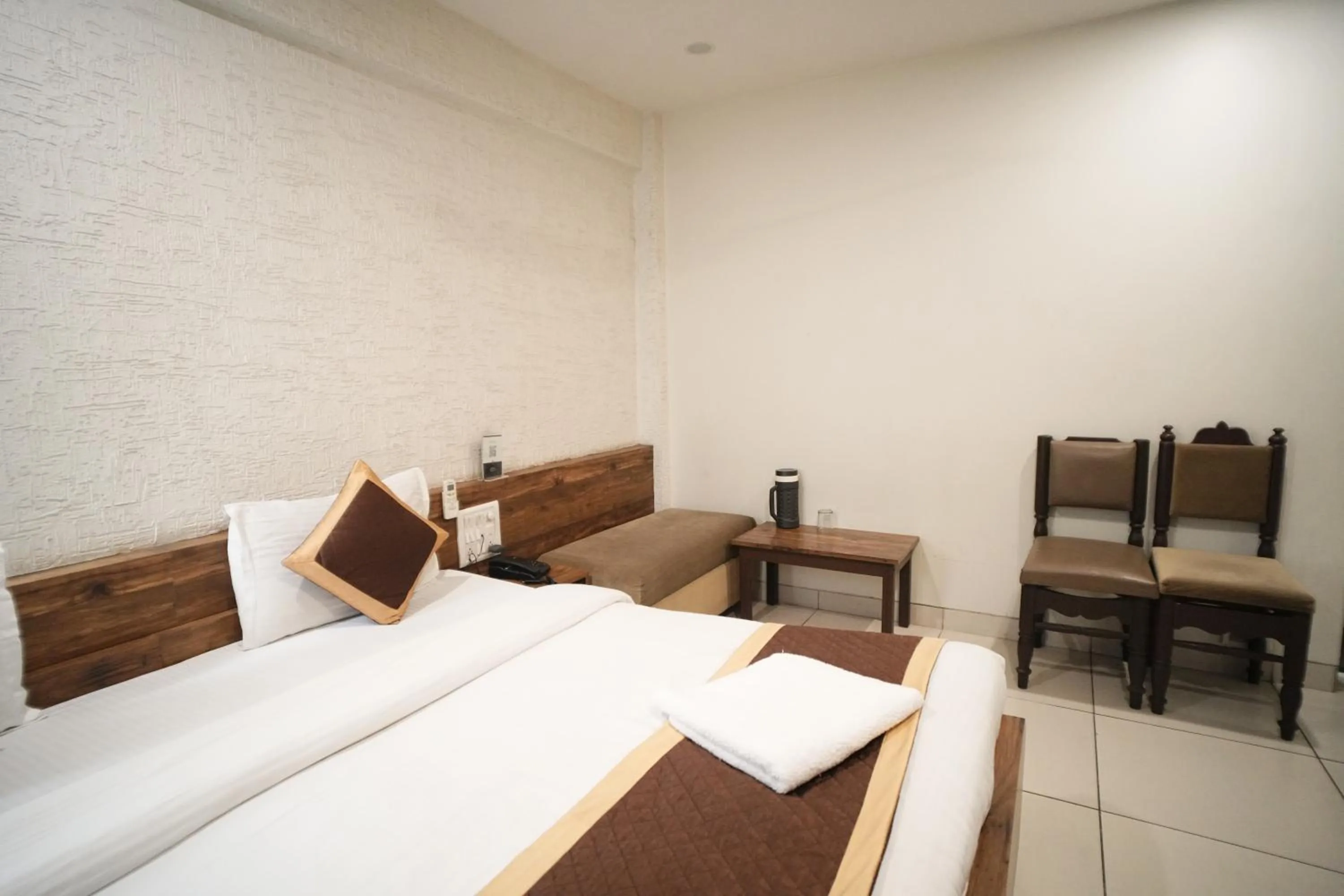 Bed in Hotel Kartiki