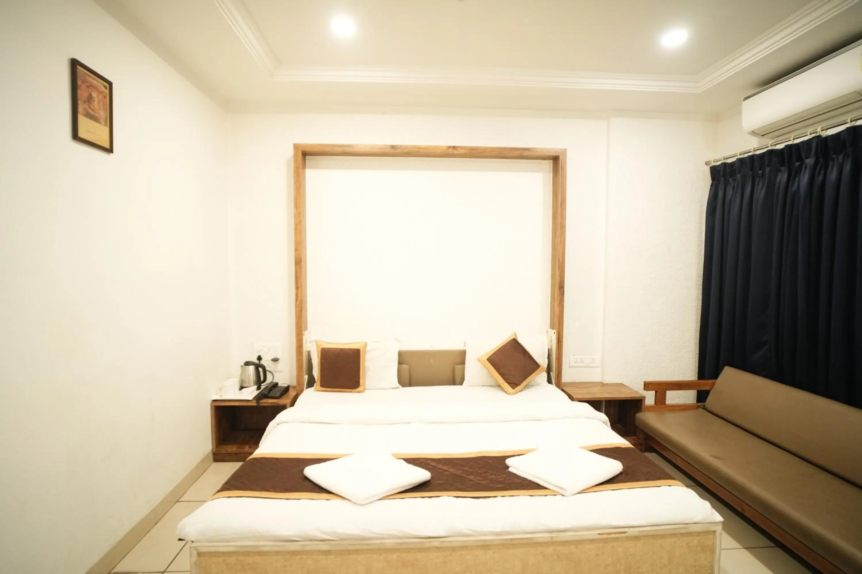 Bed in Hotel Kartiki