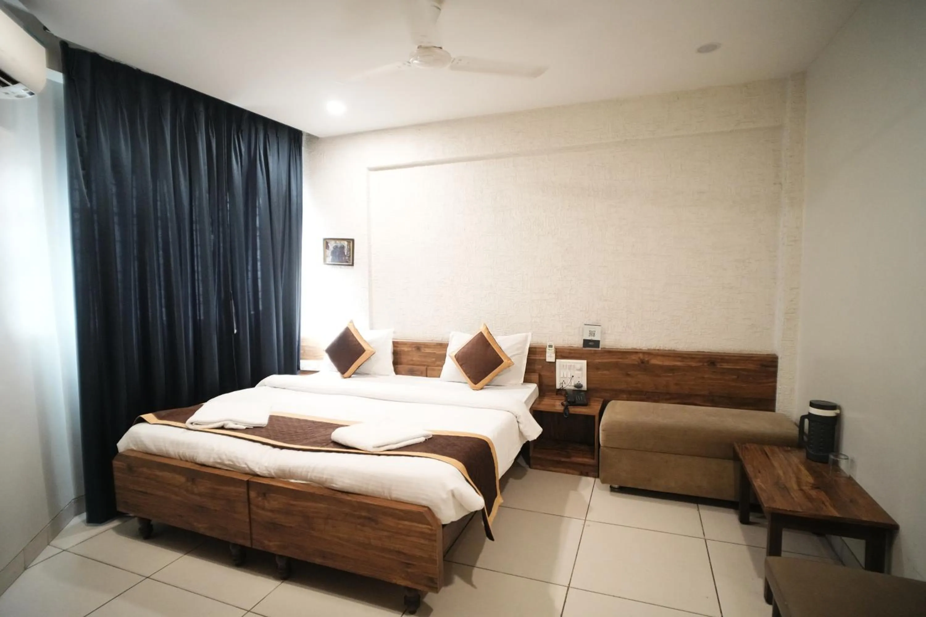 Bed in Hotel Kartiki