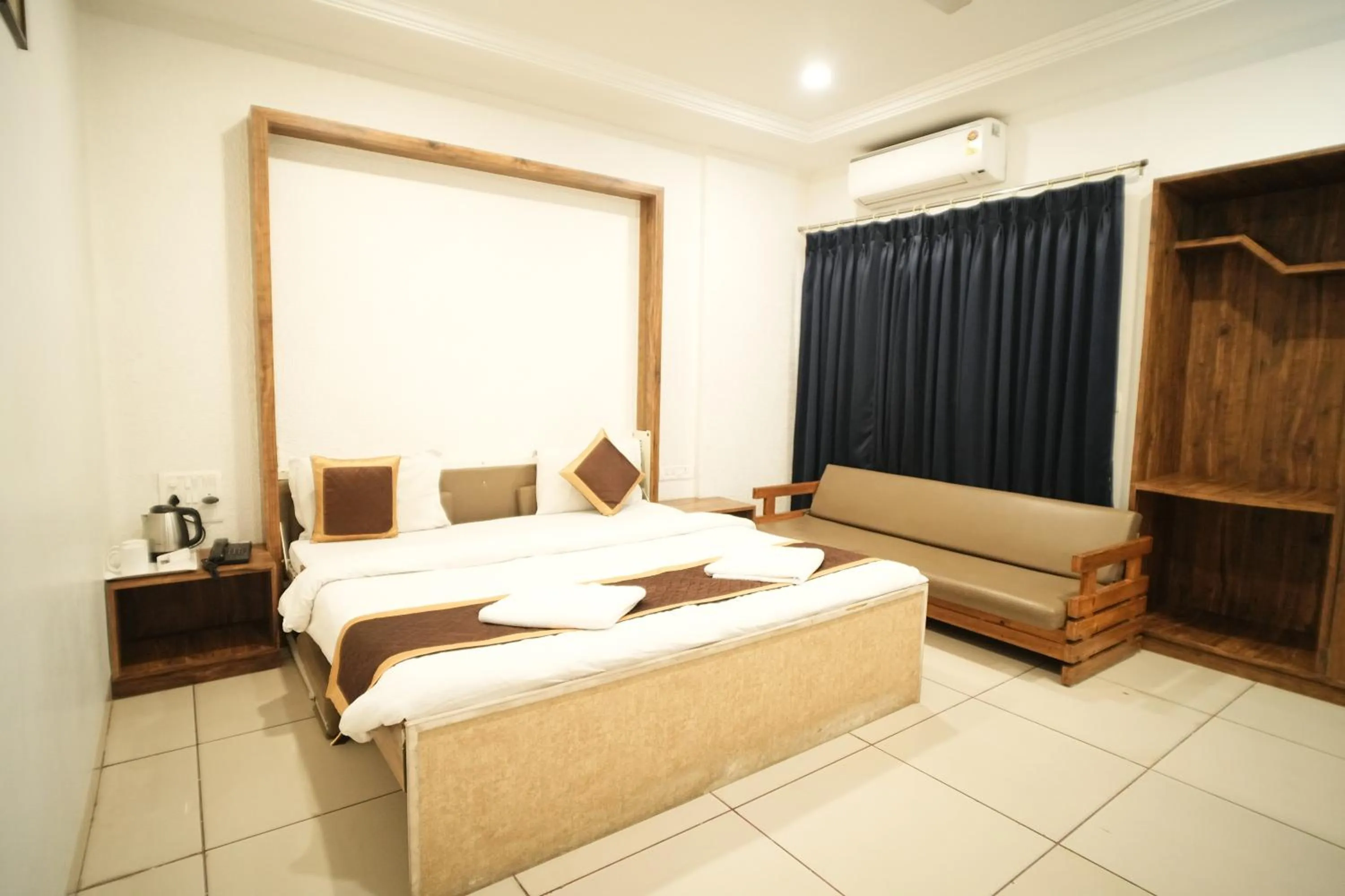 Bed in Hotel Kartiki