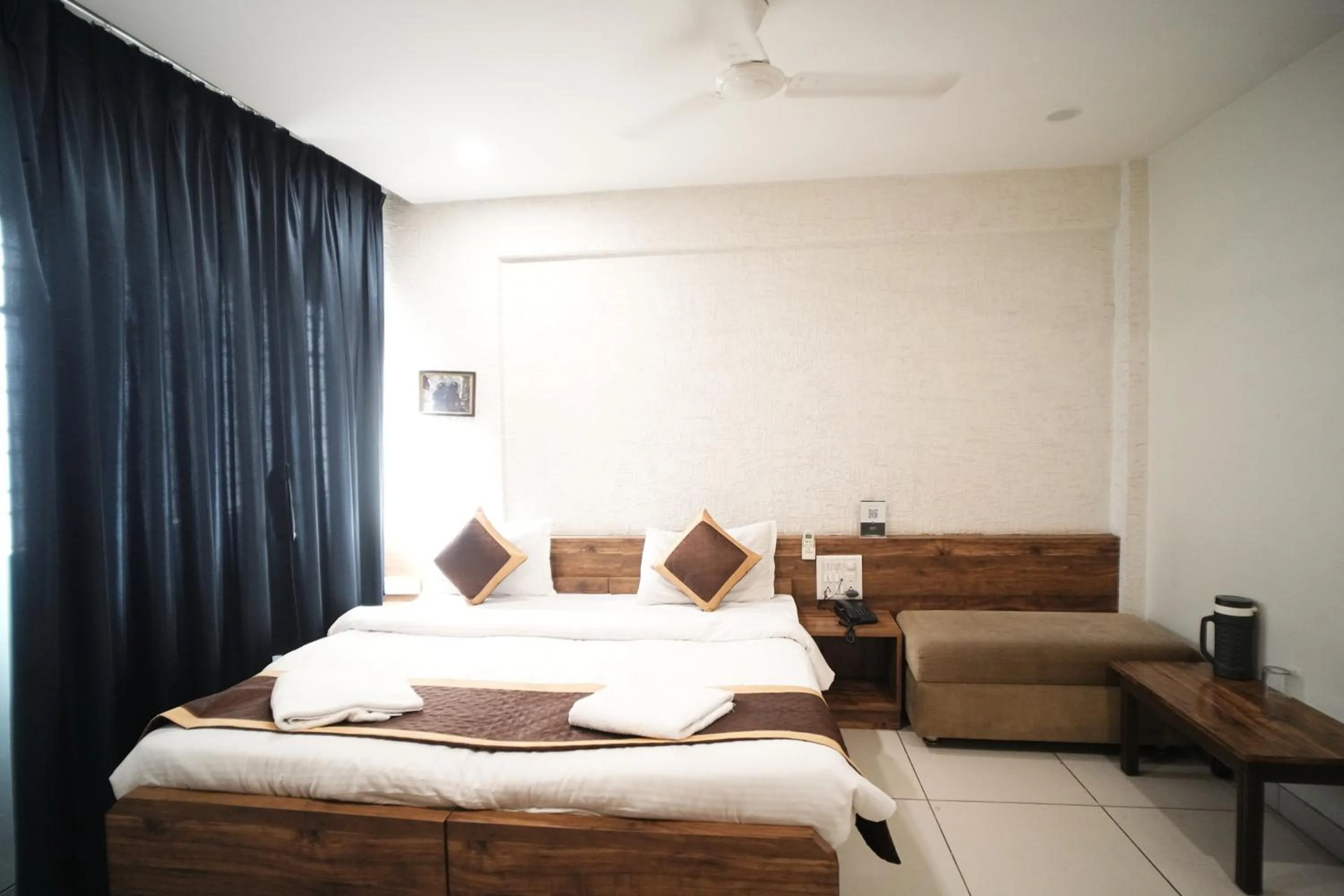 Bed in Hotel Kartiki