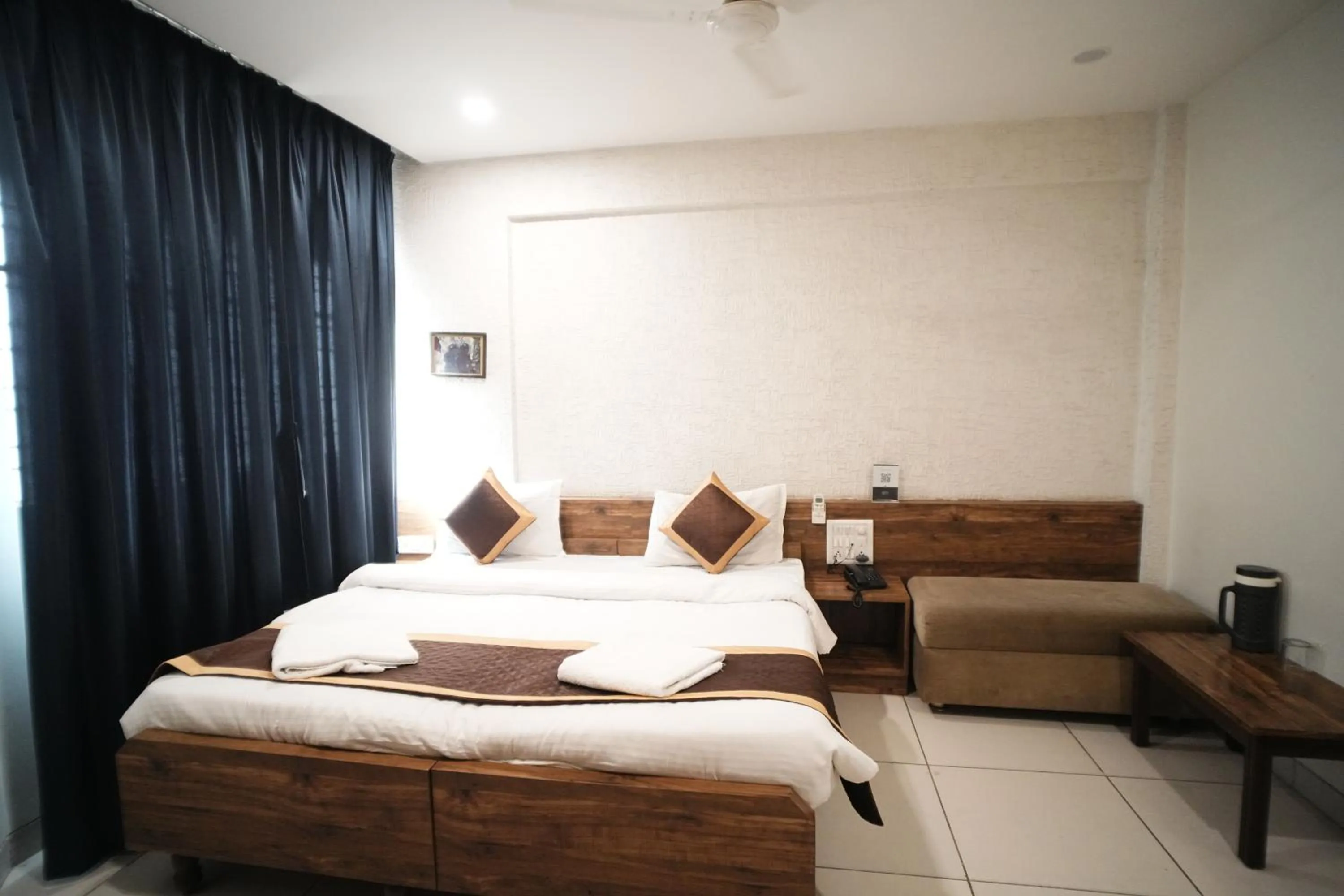 Bed in Hotel Kartiki