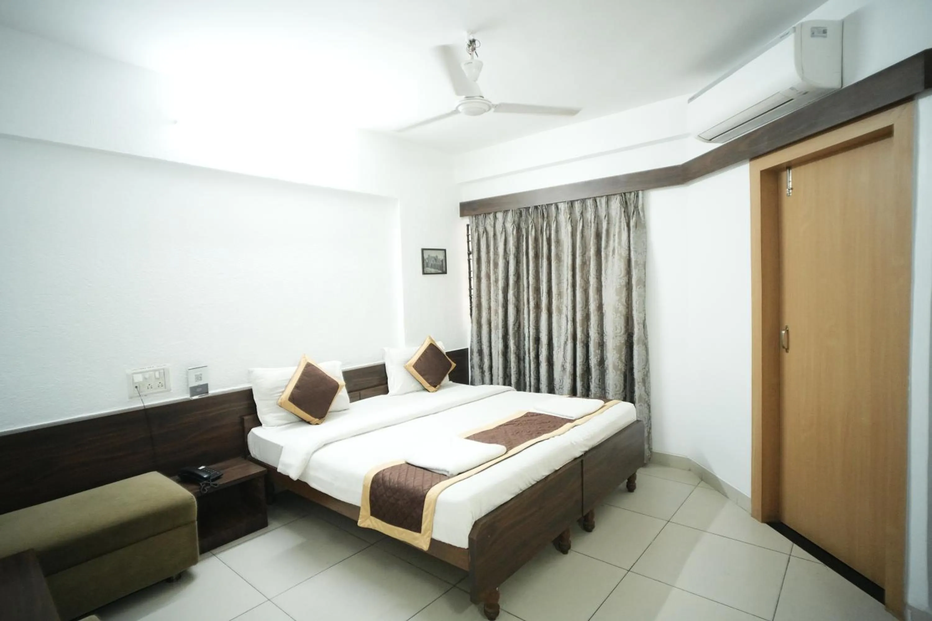 Bed in Hotel Kartiki