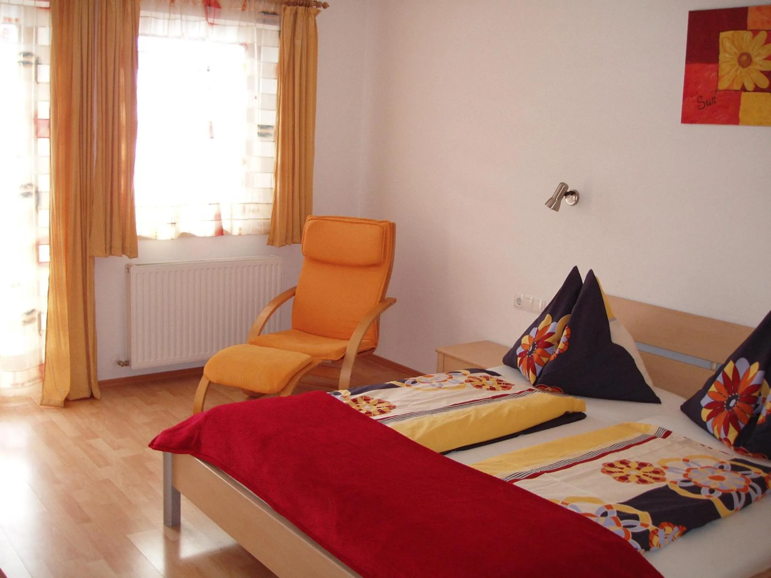 Bed in Ferienwohnung Wohlfartstätter