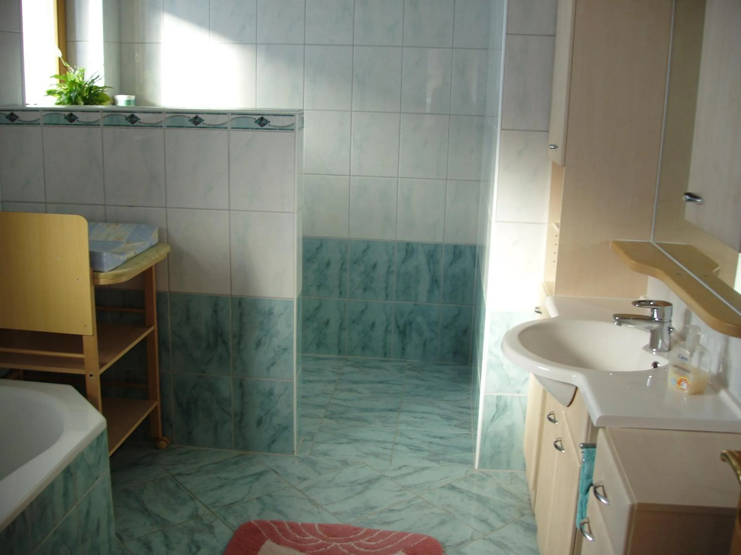 Bathroom in Ferienwohnung Wohlfartstätter