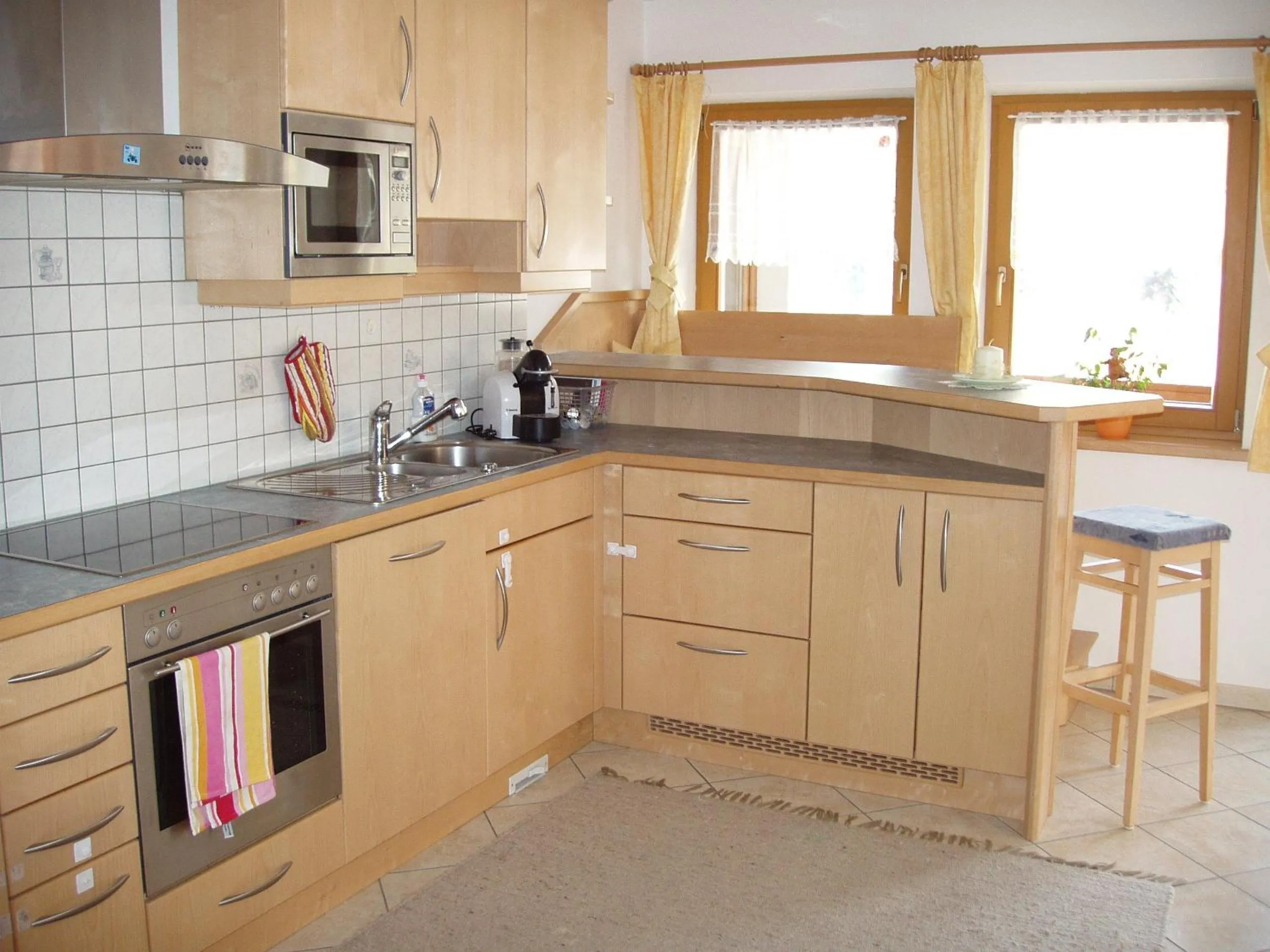 Kitchen or kitchenette in Ferienwohnung Wohlfartstätter