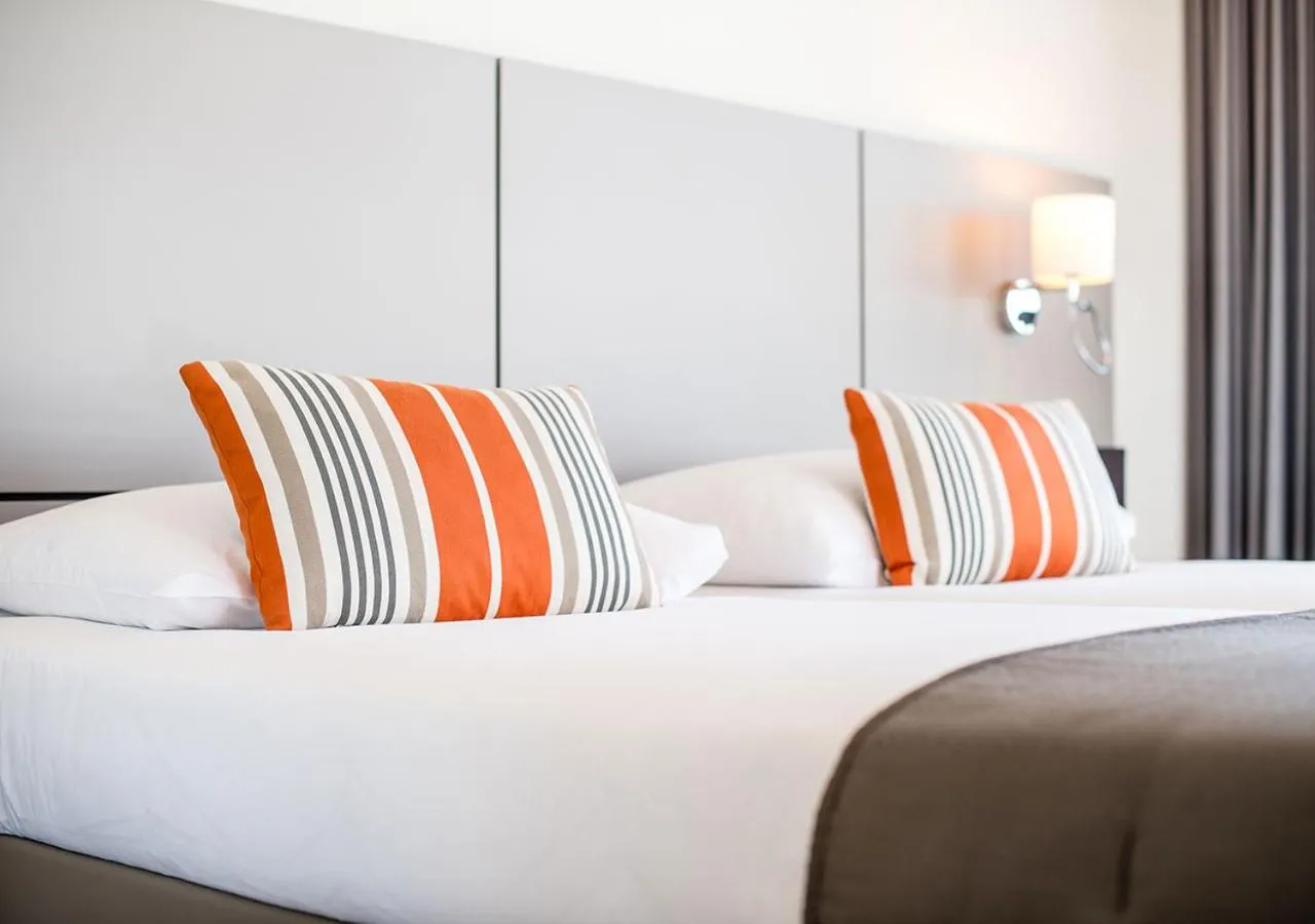 Bed in Lake Geneva Hotel