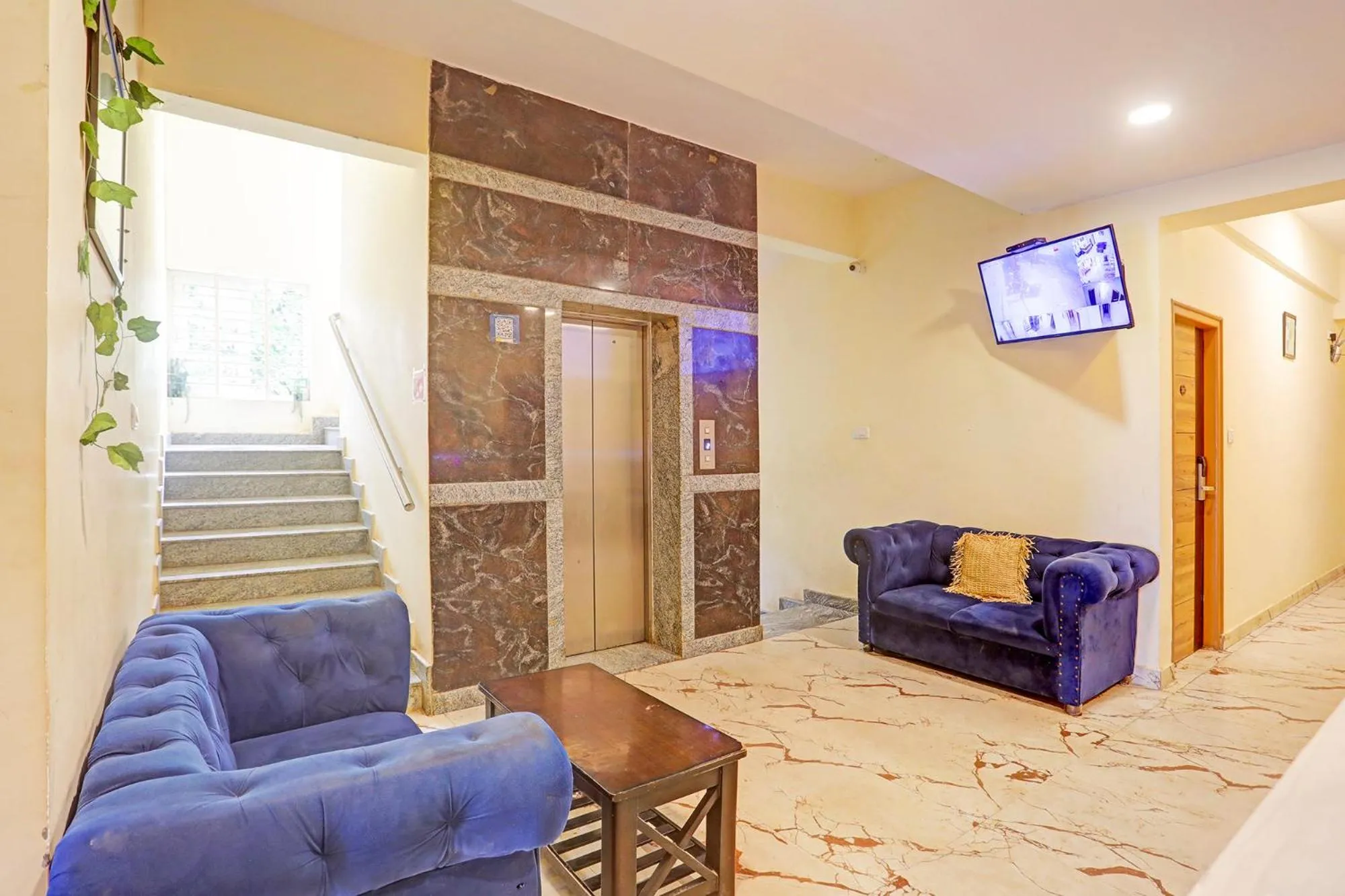 Seating area in FabHotel Kings Palace Manyata - Near Manyata Tech Park Main Gate