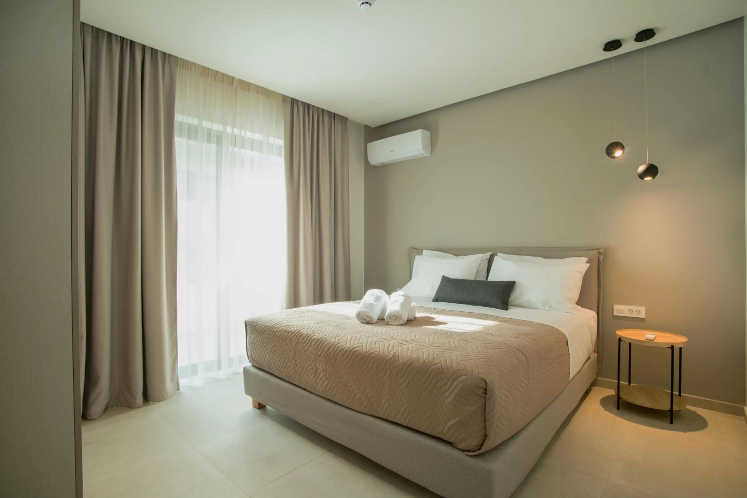 Bed in Celine Luxury Apartments & Suites