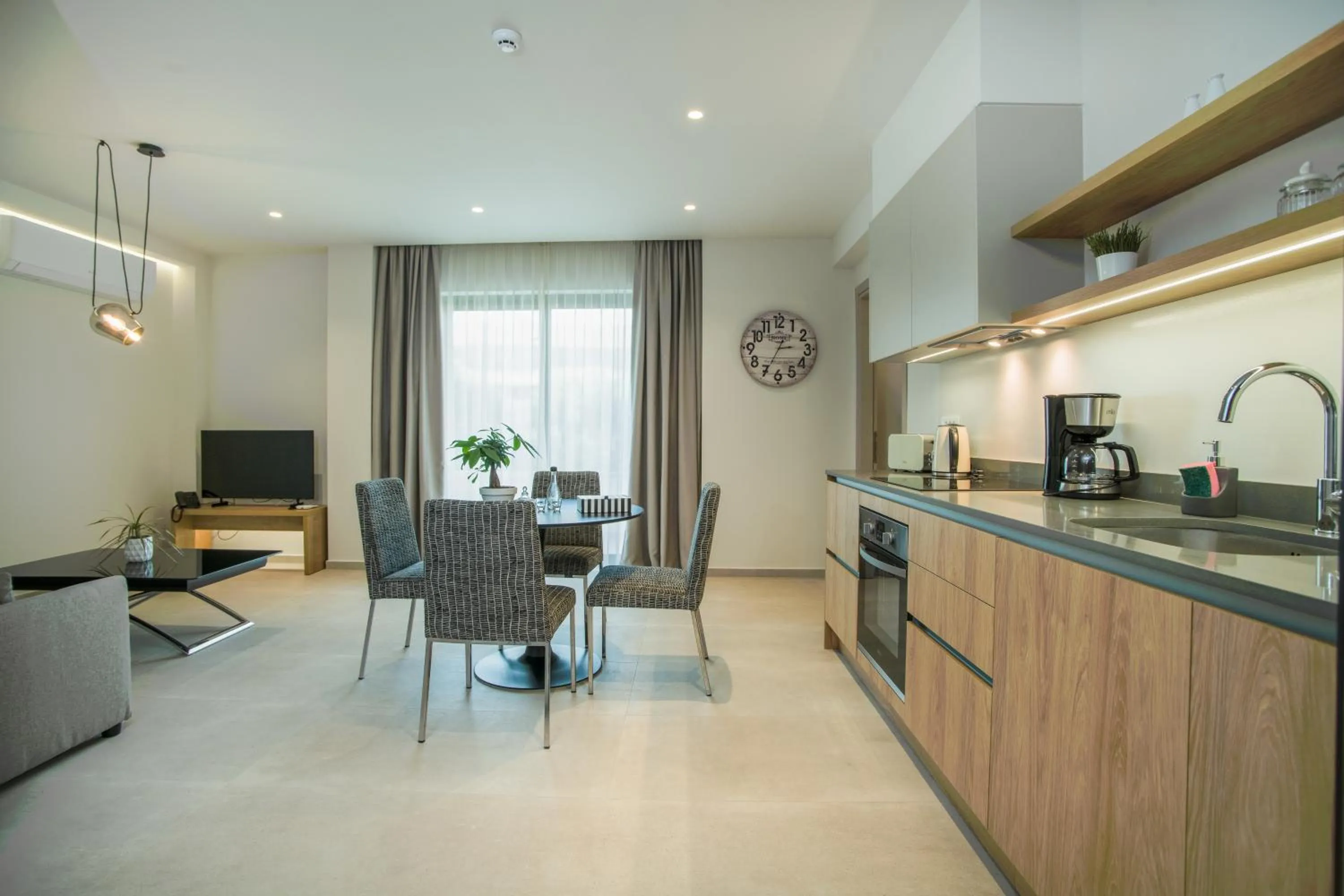 TV and multimedia in Celine Luxury Apartments & Suites