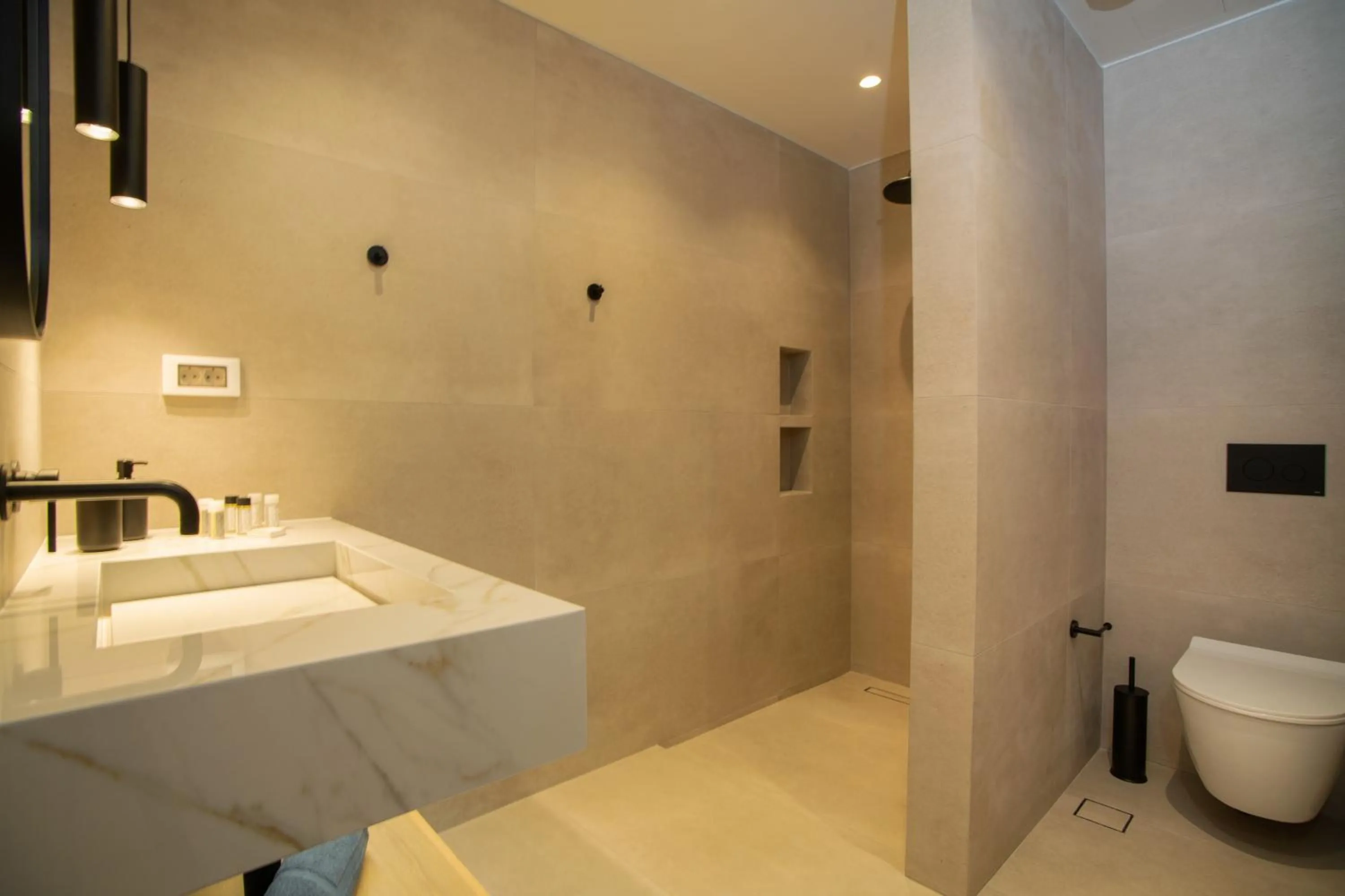 Shower in Celine Luxury Apartments & Suites