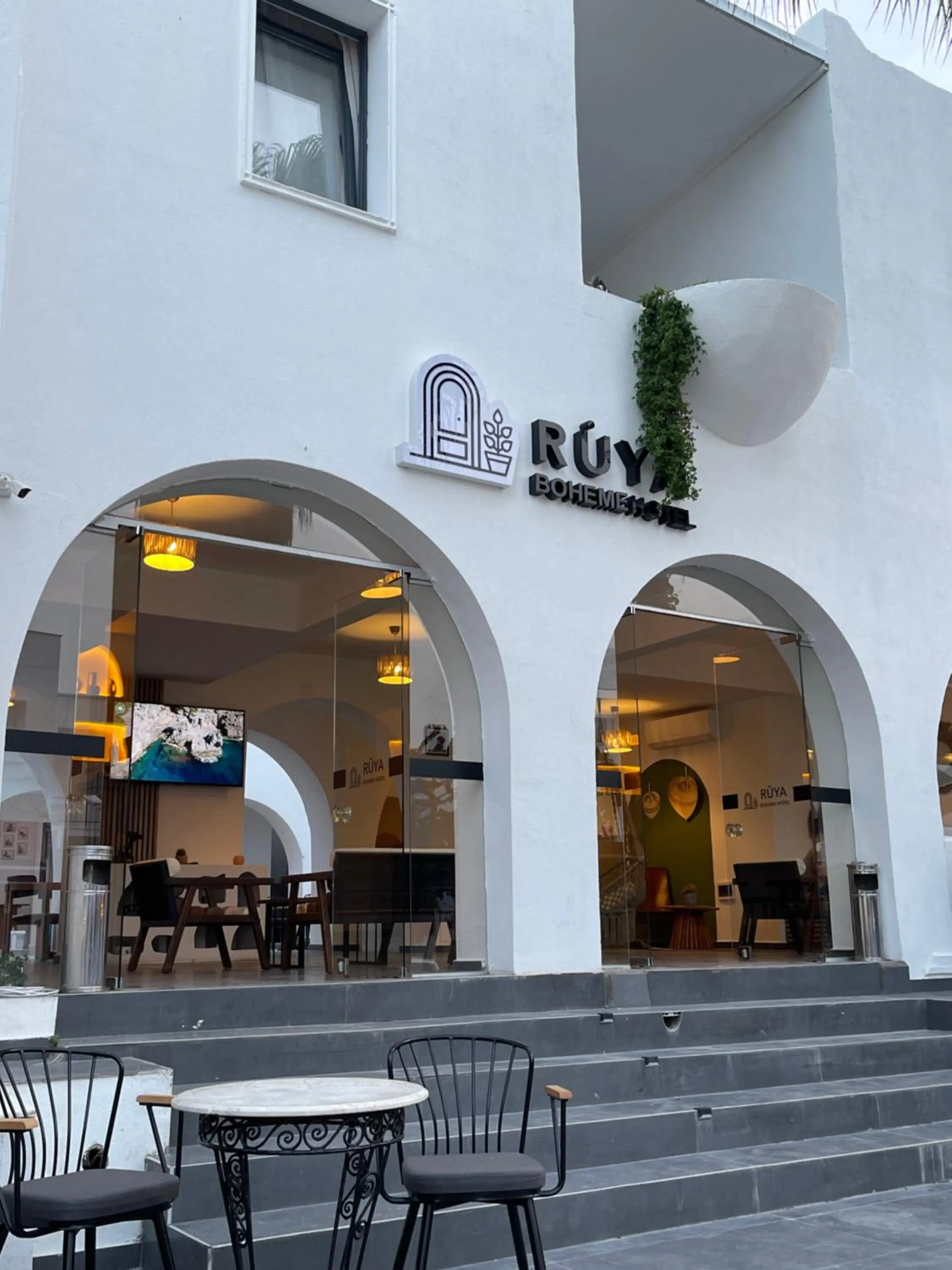 Text overlay in RÜYA BOHEME HOTEL BODRUM