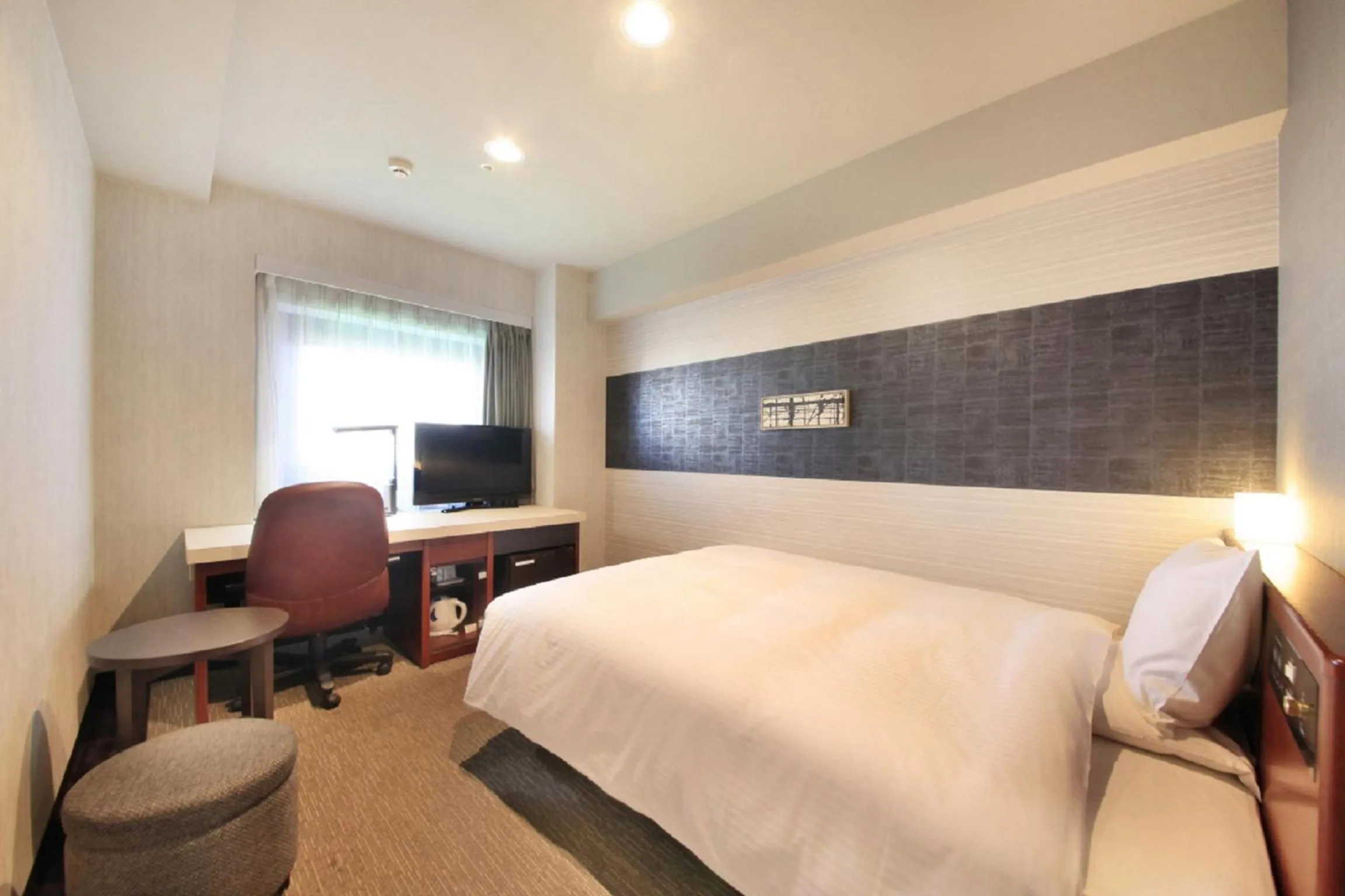 Bed in Richmond Hotel Tokyo Musashino