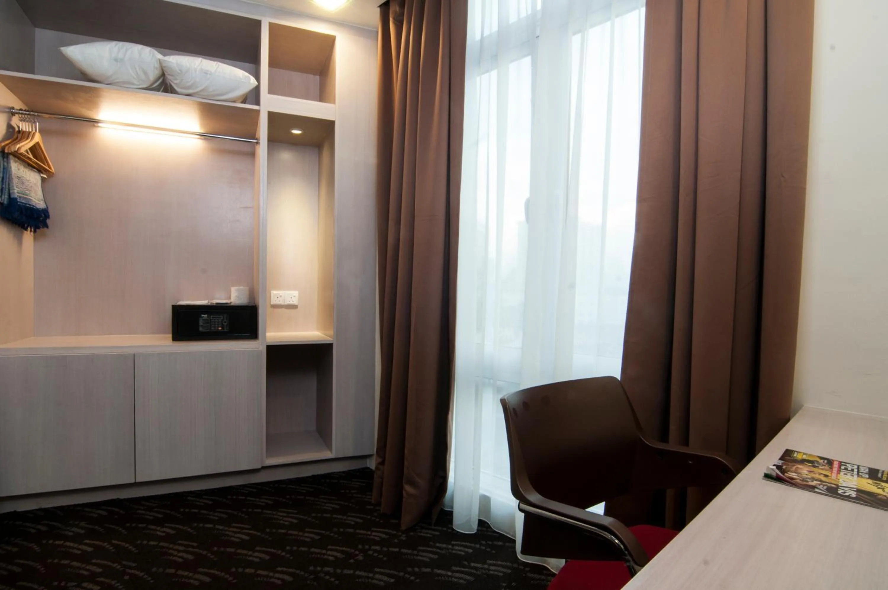 Seating area, Bed in Scott Hotel KL Sentral