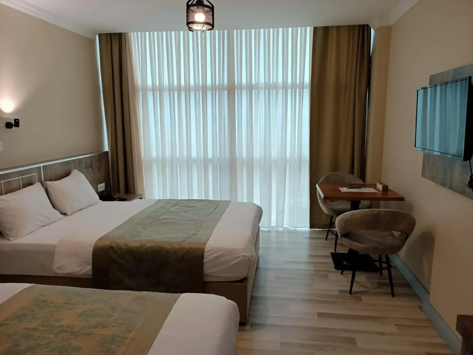 Deluxe Double Room (2 Adults + 1 Child) in Bal Hotel Deluxe Double Room (2 Adults + 1 Child) in Bal Hotel