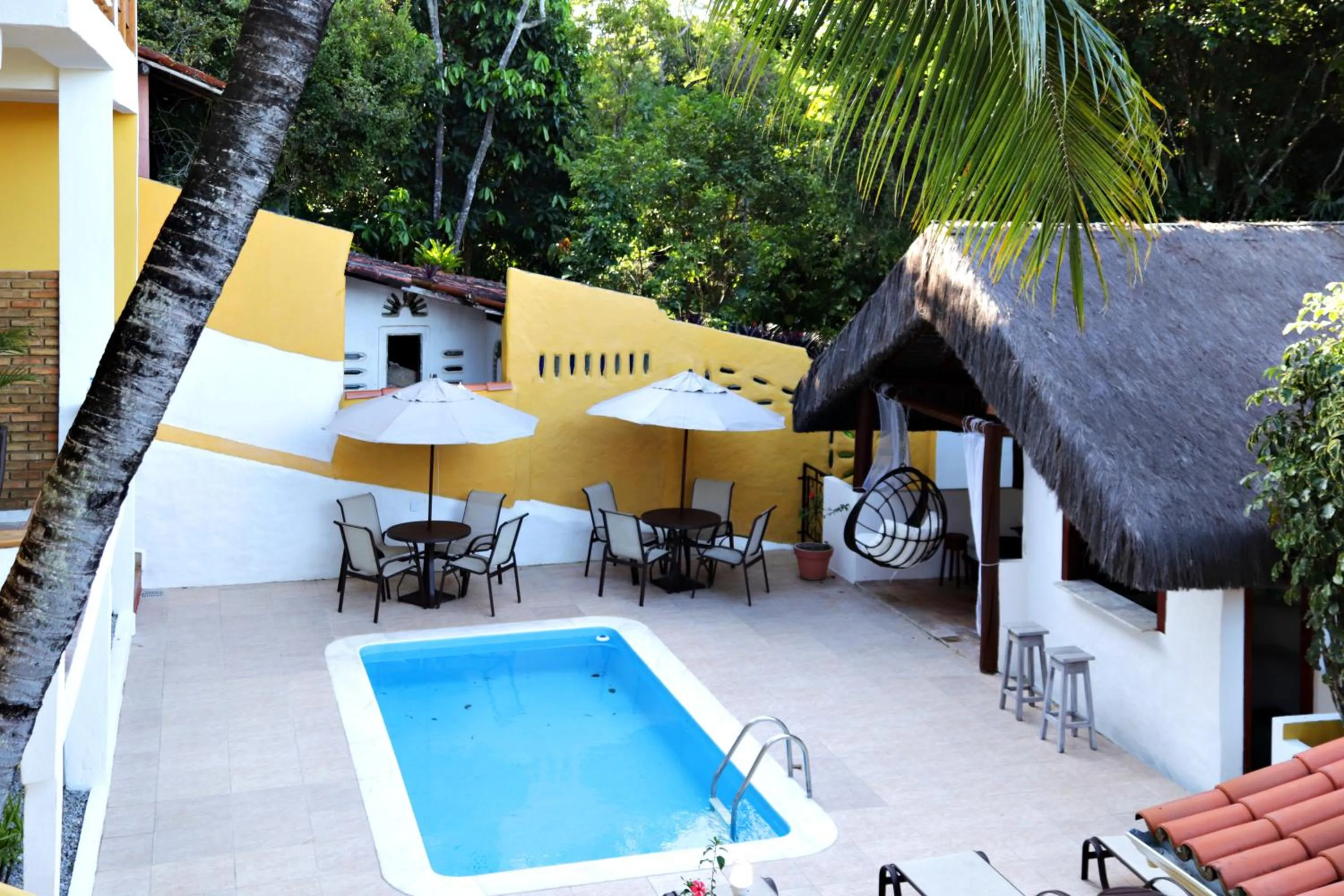 Patio in Pousada Arraial Colonial, Localizada no Centrinho e de Fácil Acesso a Praia e a Rua Mucugê