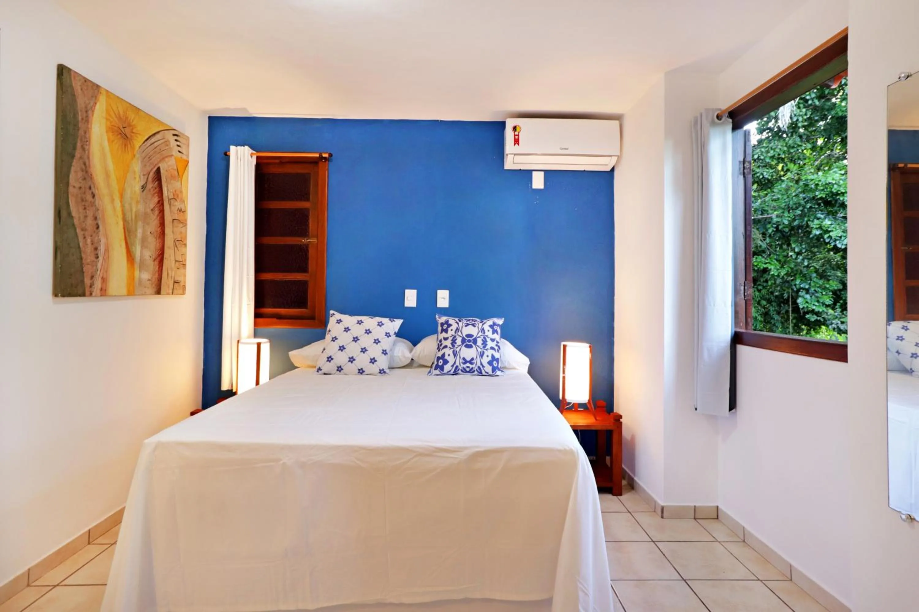 Bed in Pousada Arraial Colonial, Localizada no Centrinho e de Fácil Acesso a Praia e a Rua Mucugê