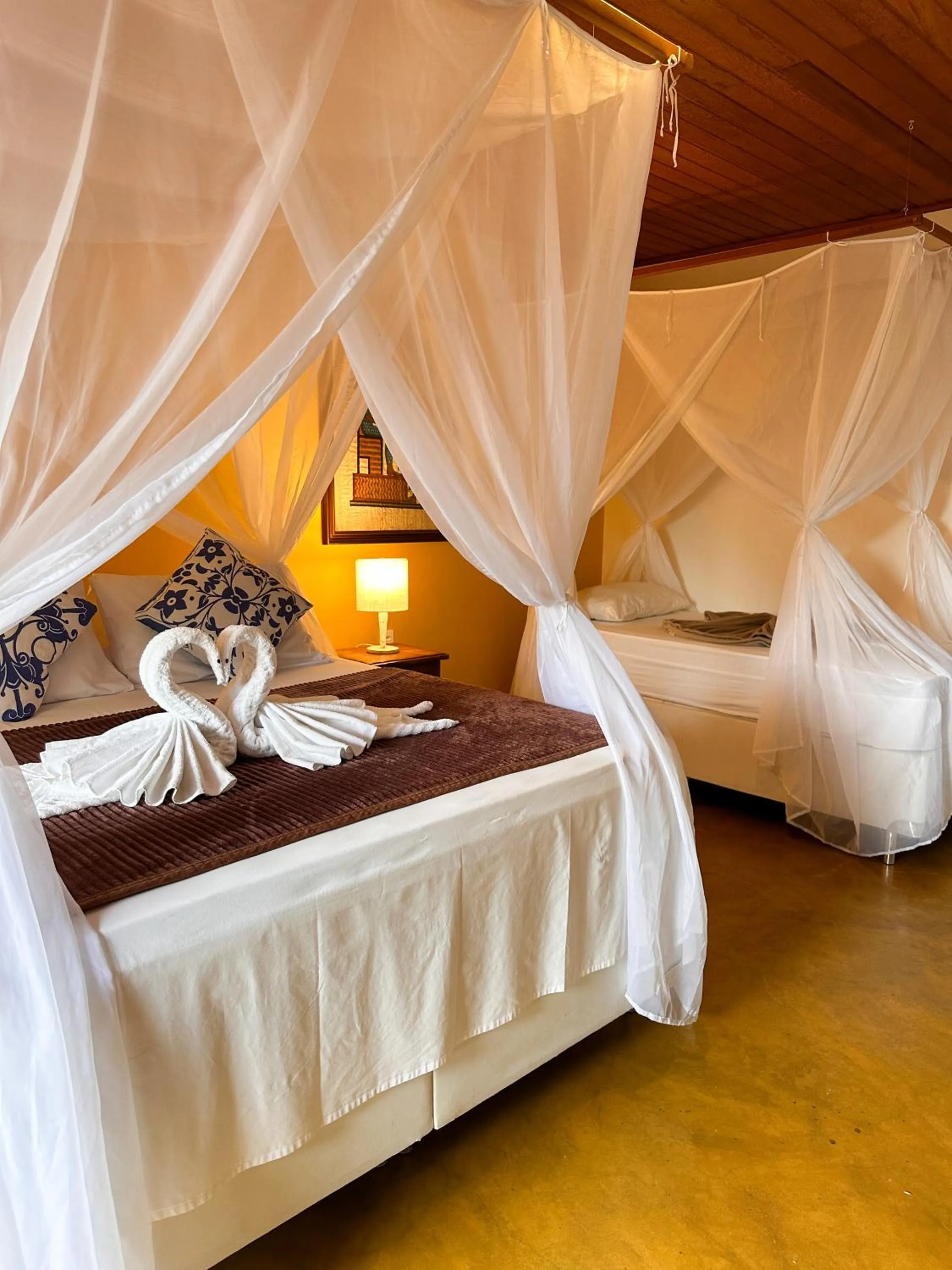 Bed in Pousada Arraial Colonial, Localizada no Centrinho e de Fácil Acesso a Praia e a Rua Mucugê