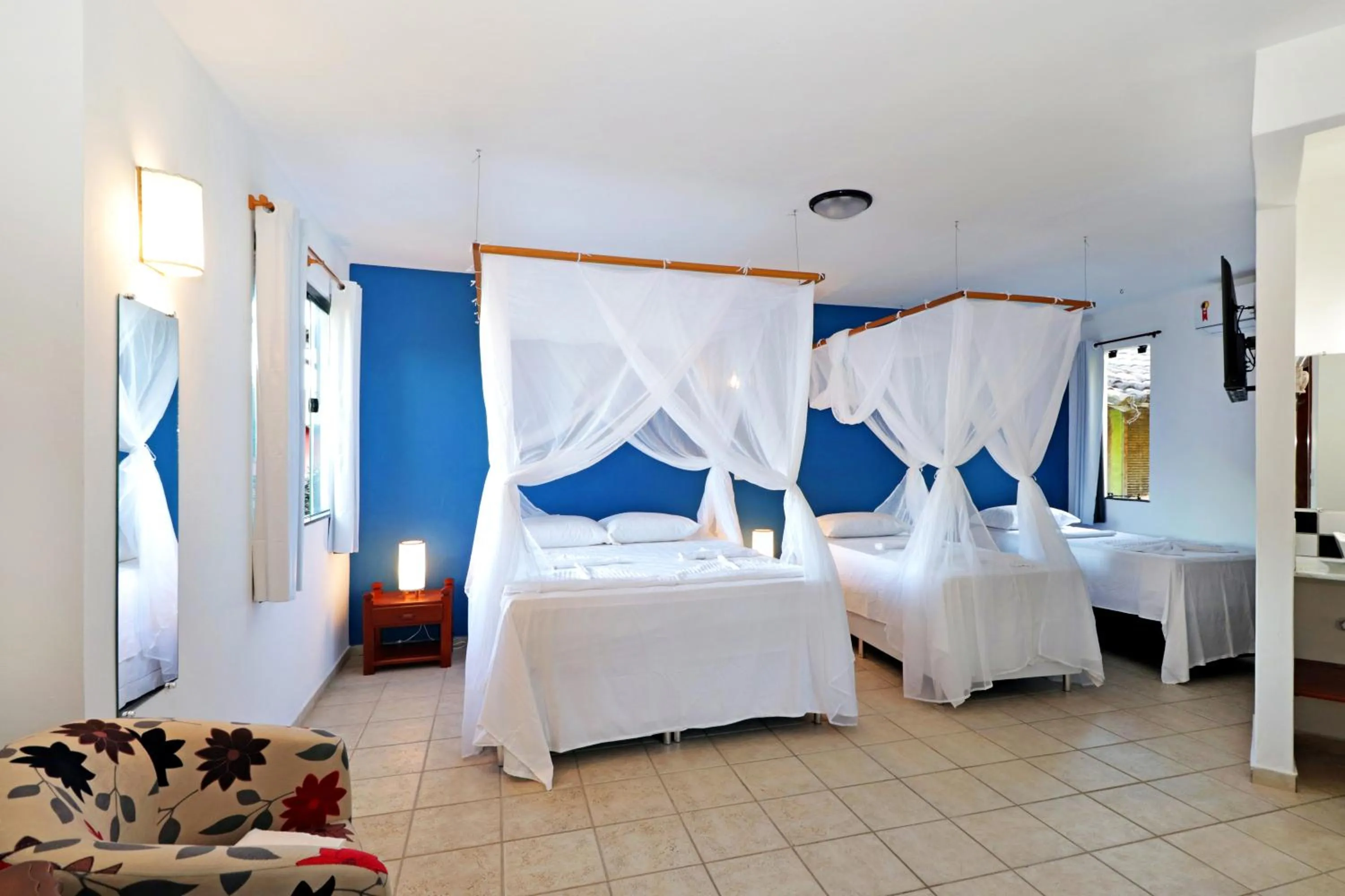 Bed in Pousada Arraial Colonial, Localizada no Centrinho e de Fácil Acesso a Praia e a Rua Mucugê