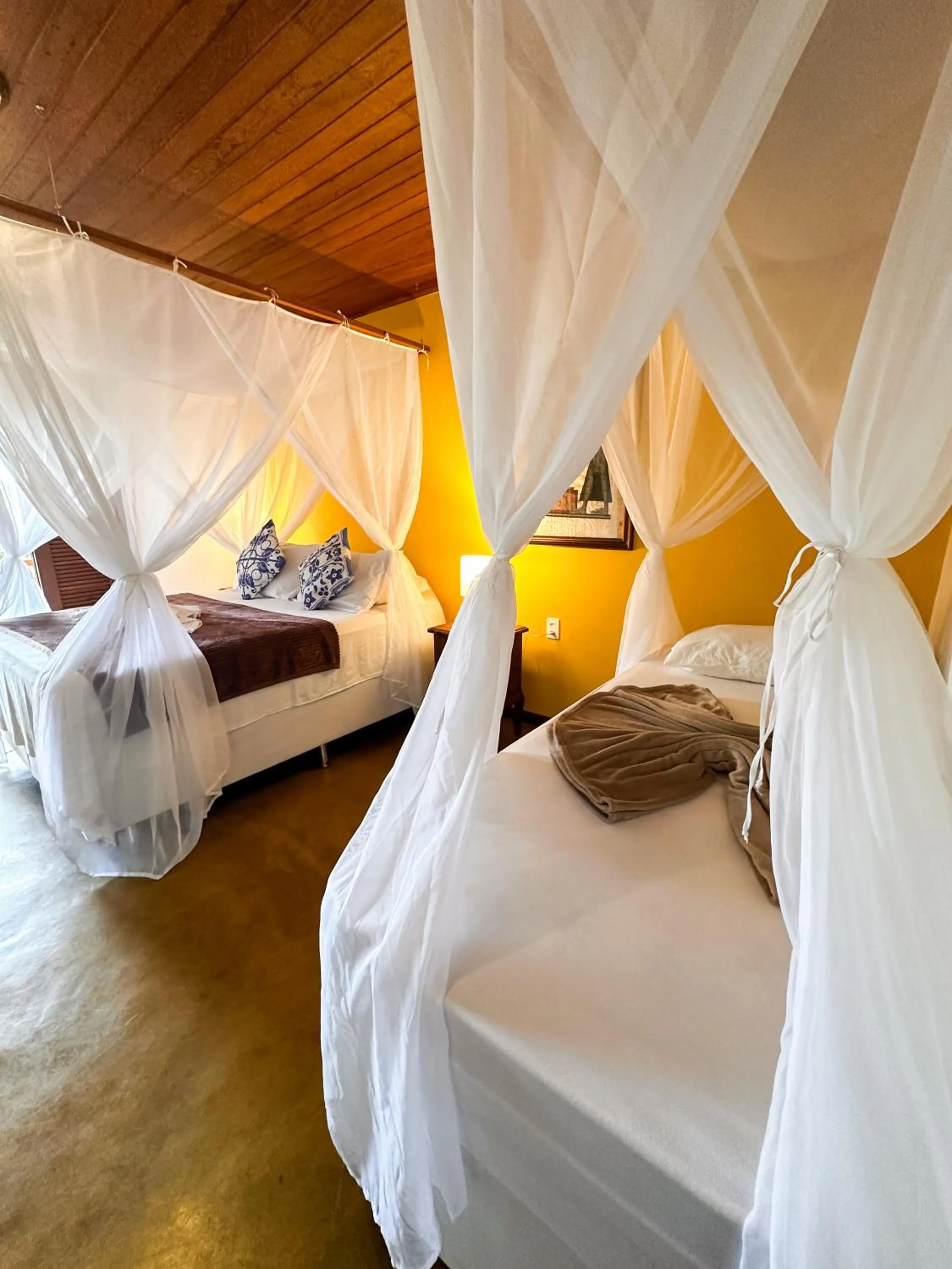 Bed in Pousada Arraial Colonial, Localizada no Centrinho e de Fácil Acesso a Praia e a Rua Mucugê