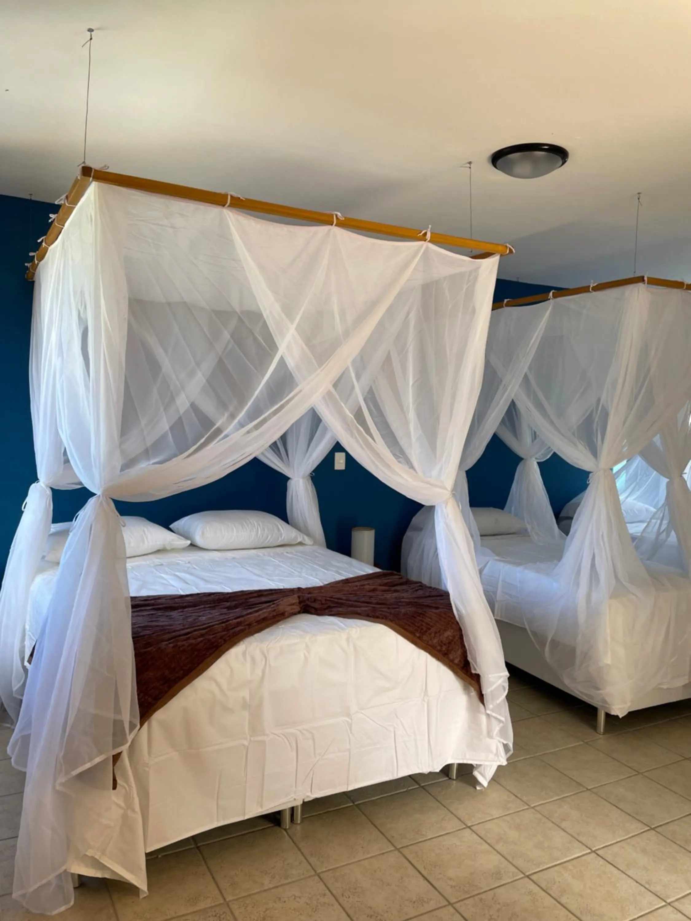 Bed in Pousada Arraial Colonial, Localizada no Centrinho e de Fácil Acesso a Praia e a Rua Mucugê