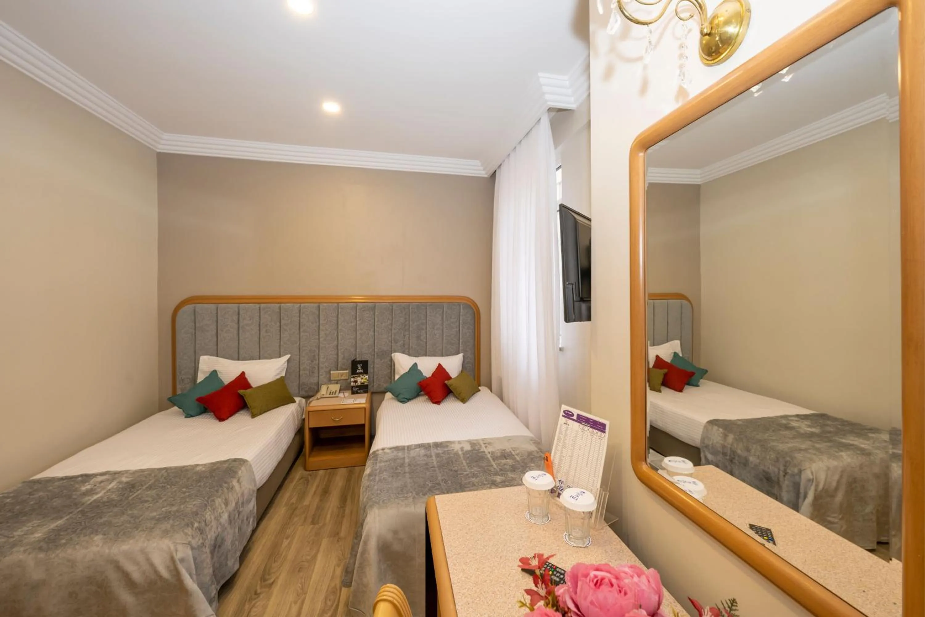 Bed in Grand Anka Hotel