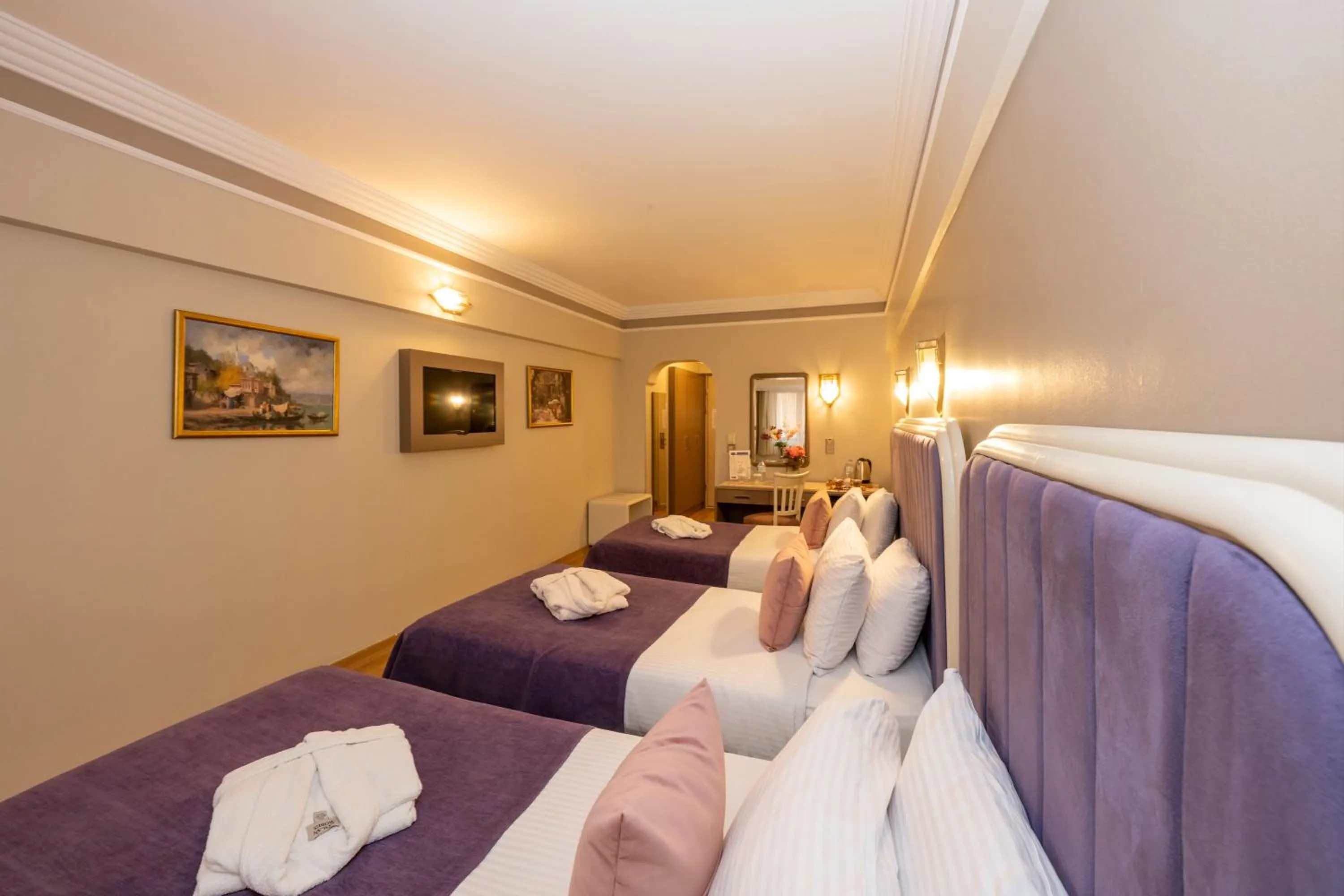 Bed in Grand Anka Hotel