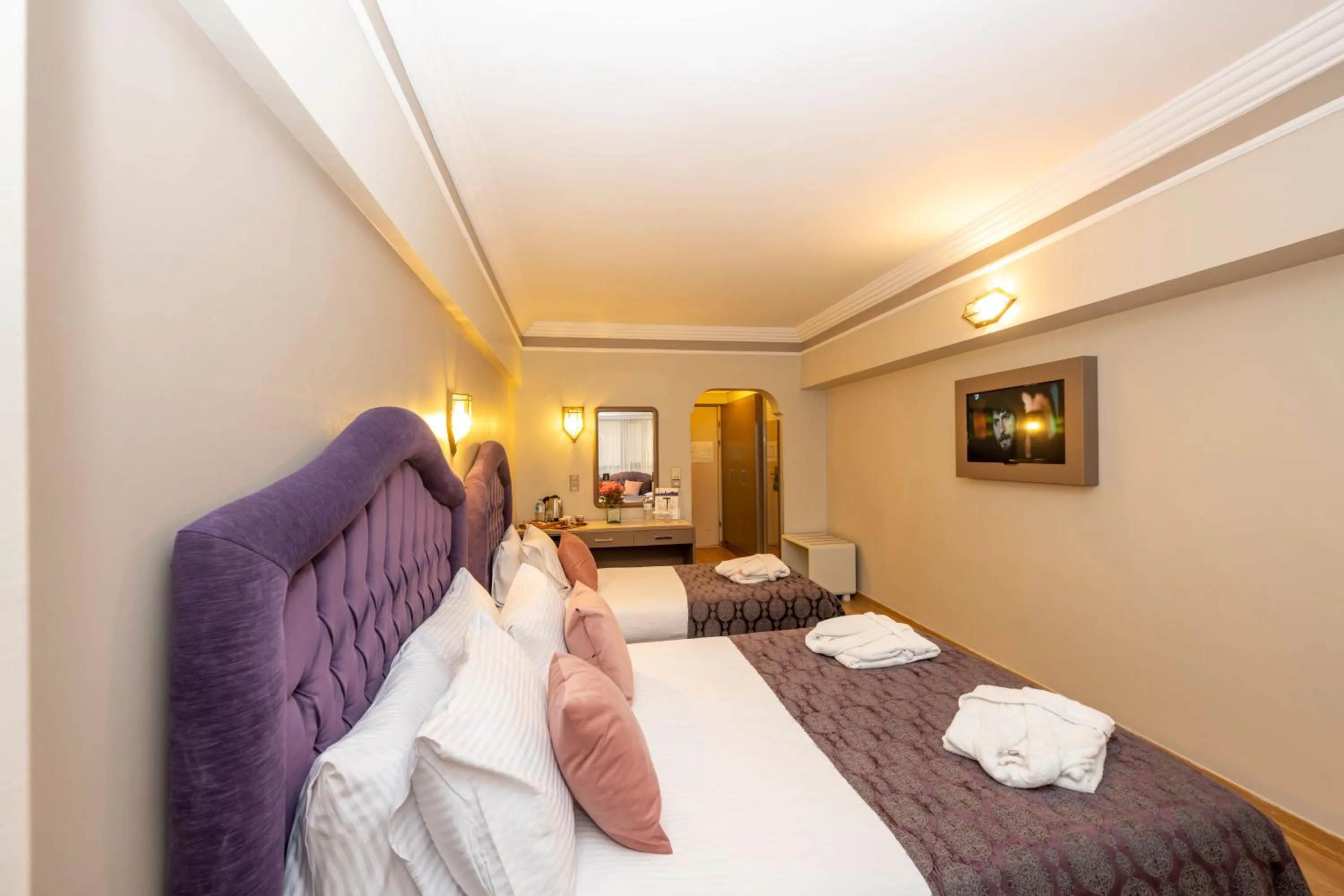 Bed in Grand Anka Hotel