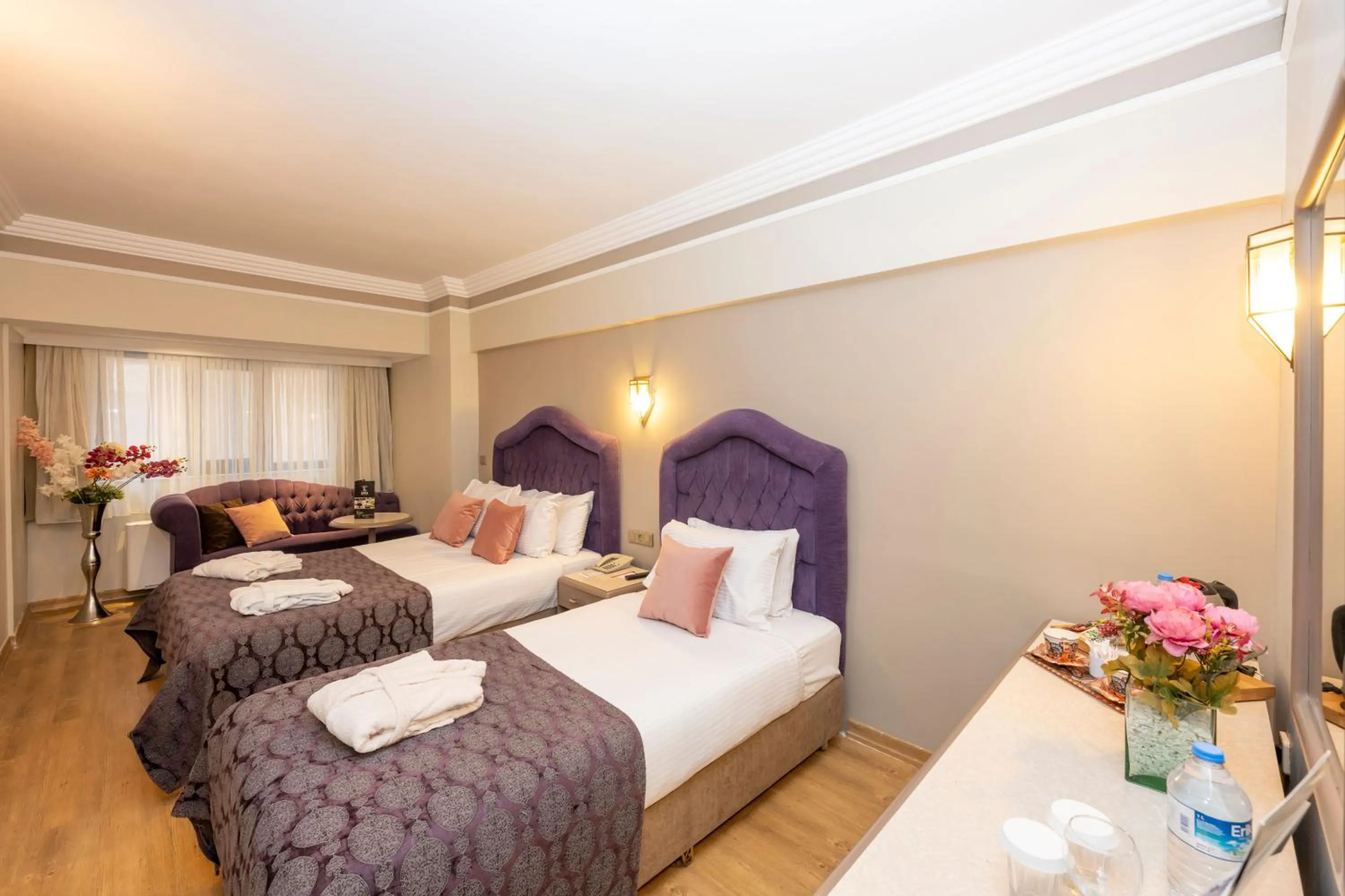 Bed in Grand Anka Hotel