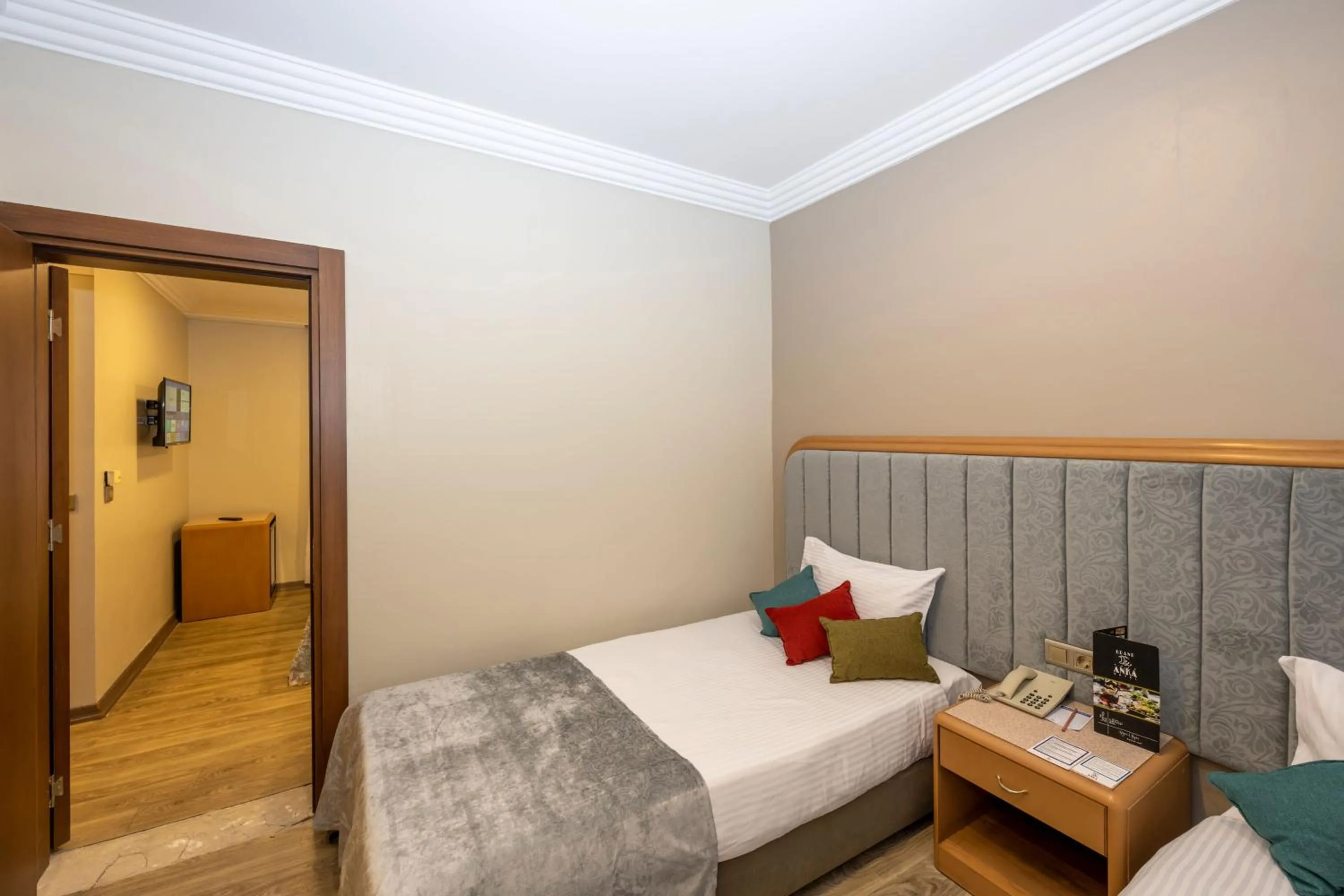 Bed in Grand Anka Hotel