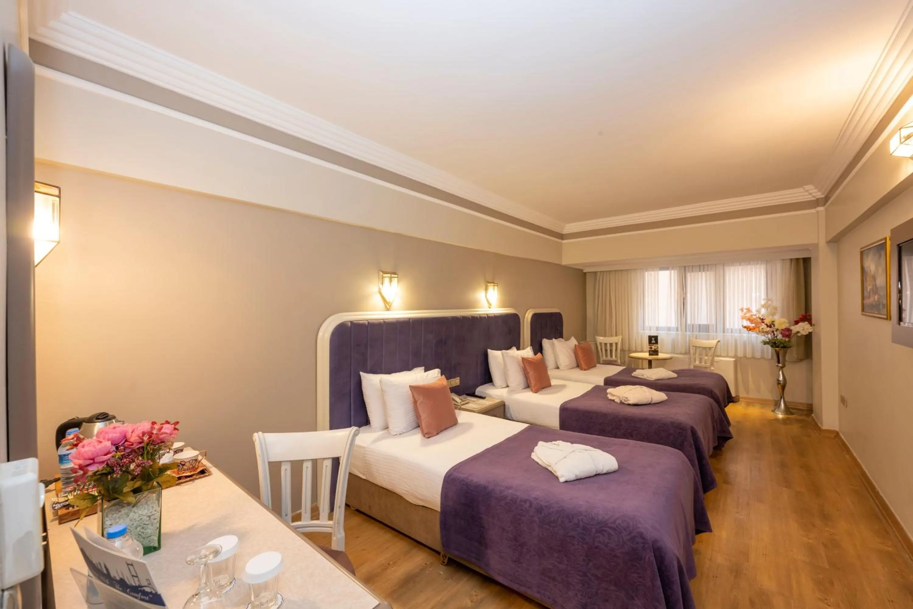 Bed in Grand Anka Hotel