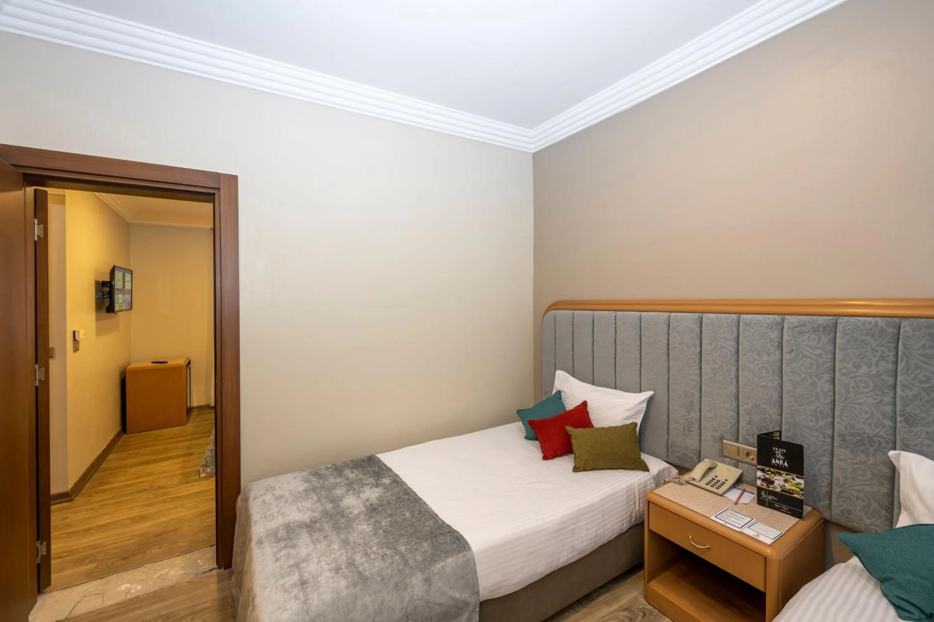 Bed in Grand Anka Hotel