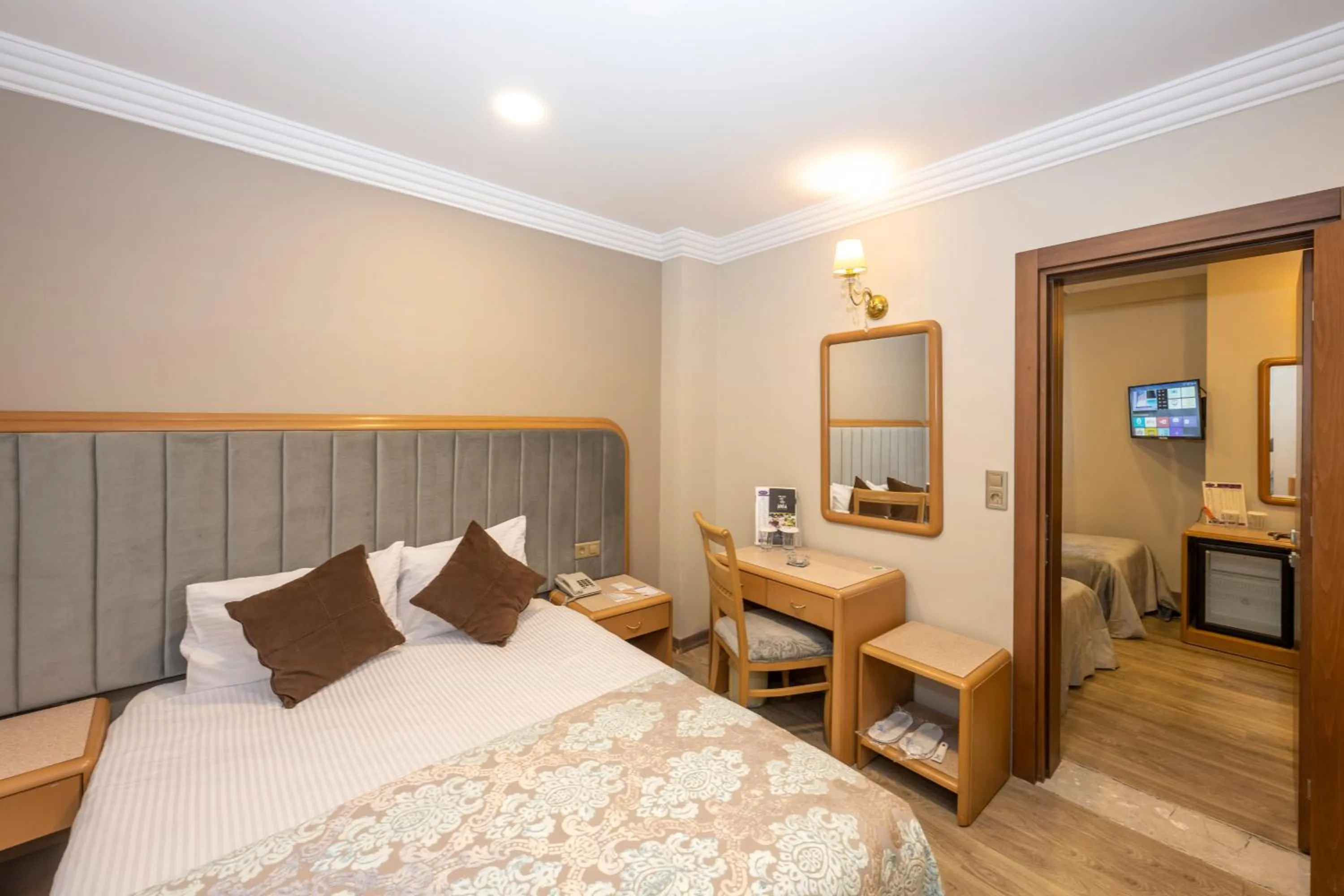 Bed in Grand Anka Hotel