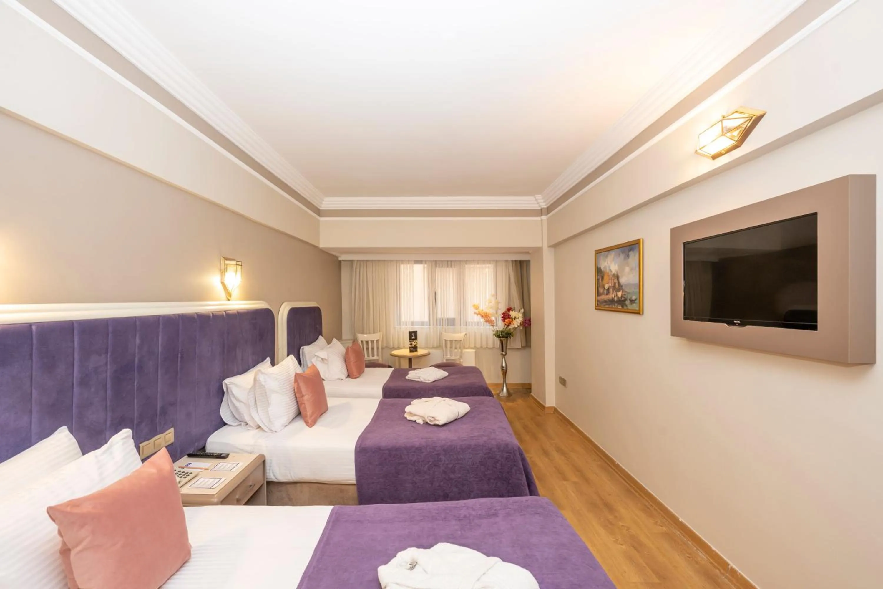 Photo of the whole room, Bed in Grand Anka Hotel