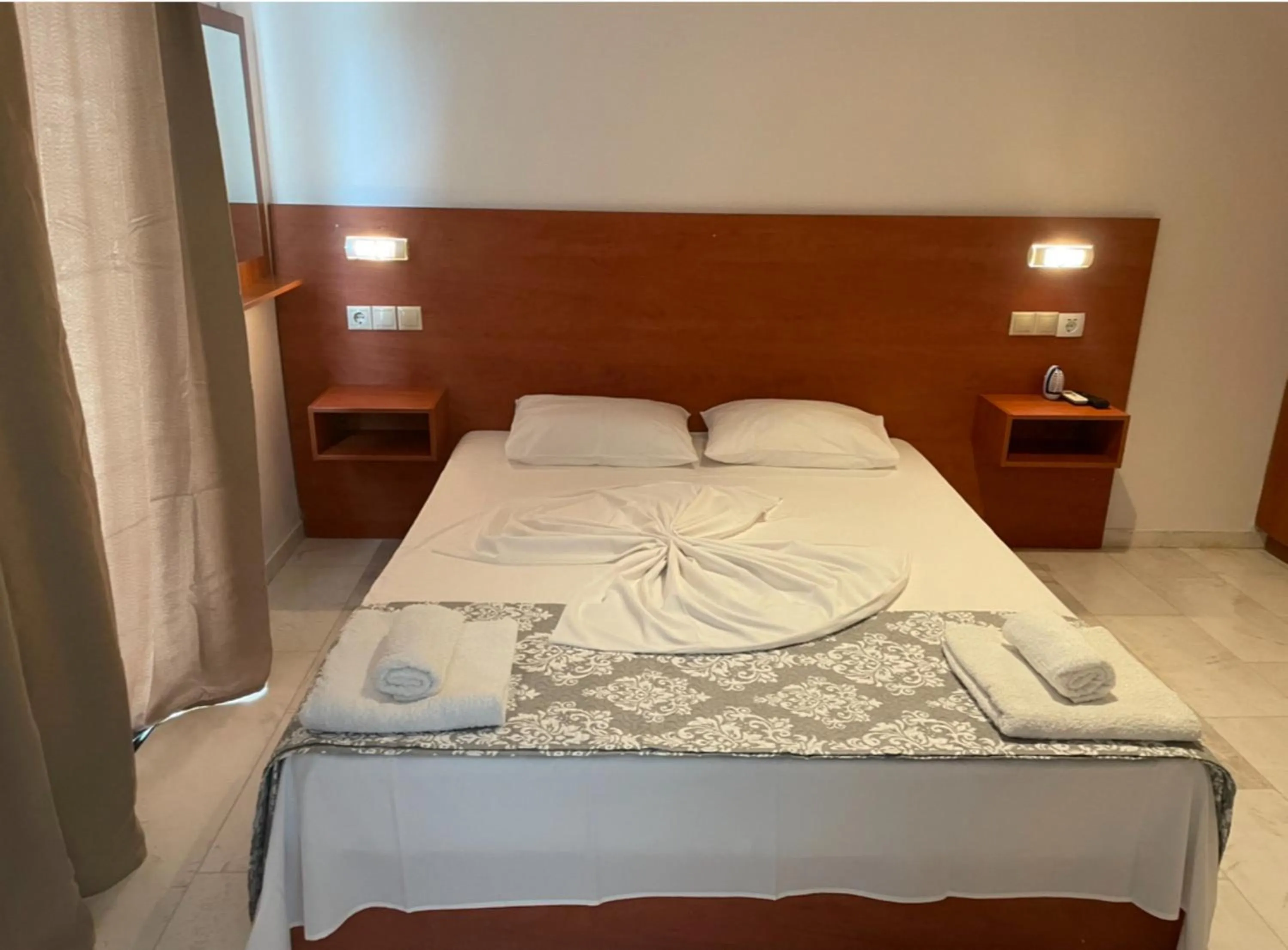 Bedroom in Hotel Kourkoumelata